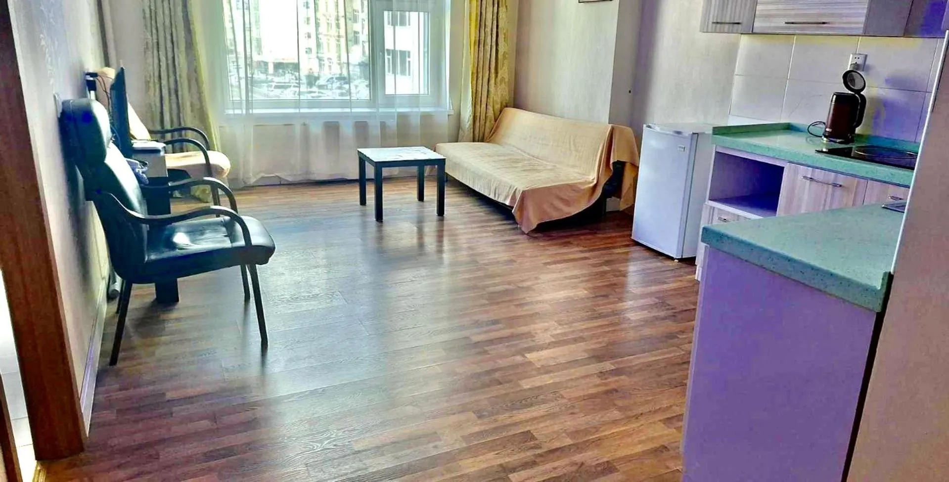 Kitchen or kitchenette in Negdelchin Hotel & Service Apartment