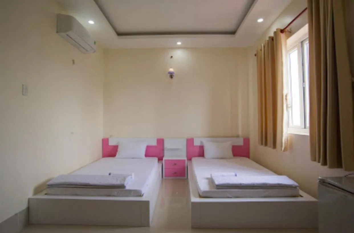 Bed in Sao Mai An Giang Hotel