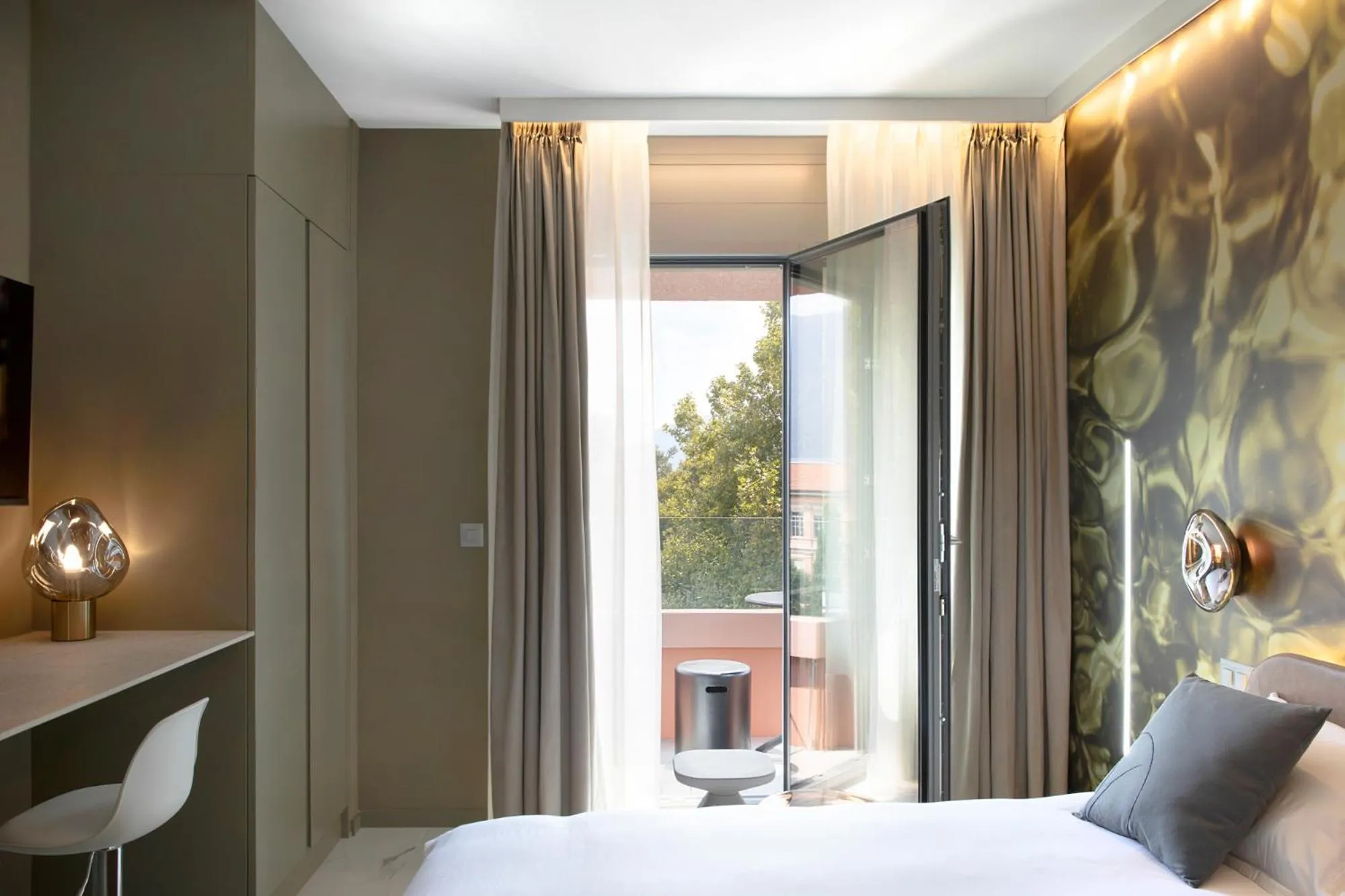 Bed in VISIONAPARTMENTS Lugano - contactless check-in