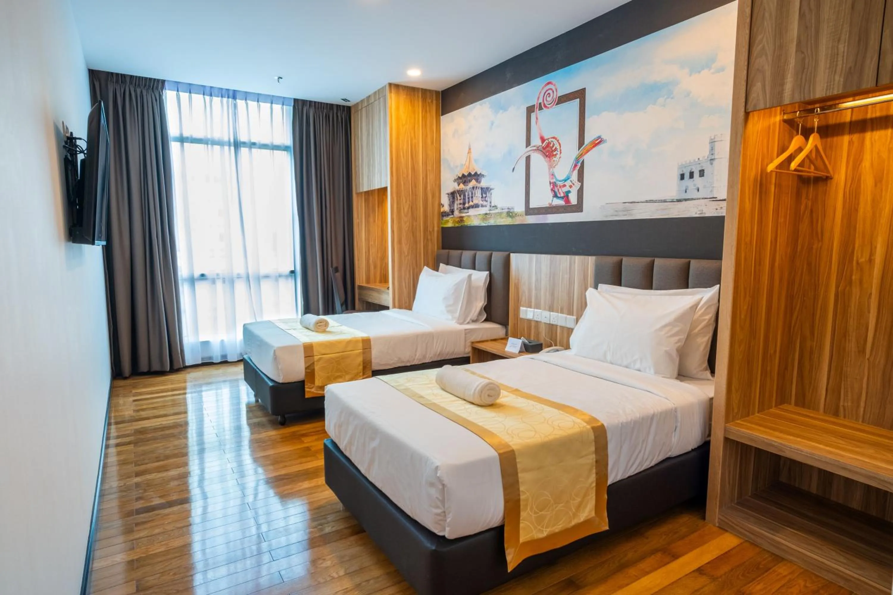 Bed in City Rise Hotel Miri