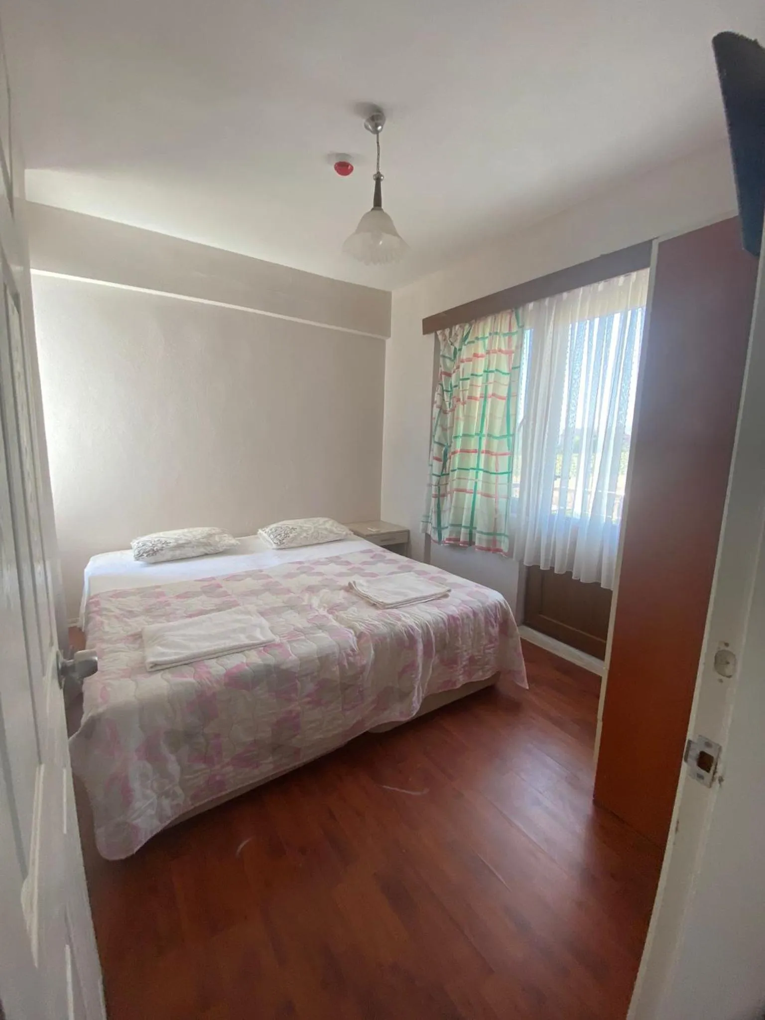 Bed in Kalanora Resort Hotel