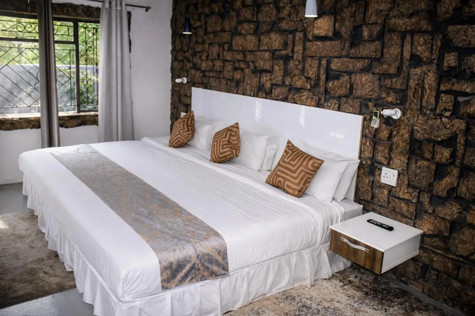 Bed in Rustiek Hotel