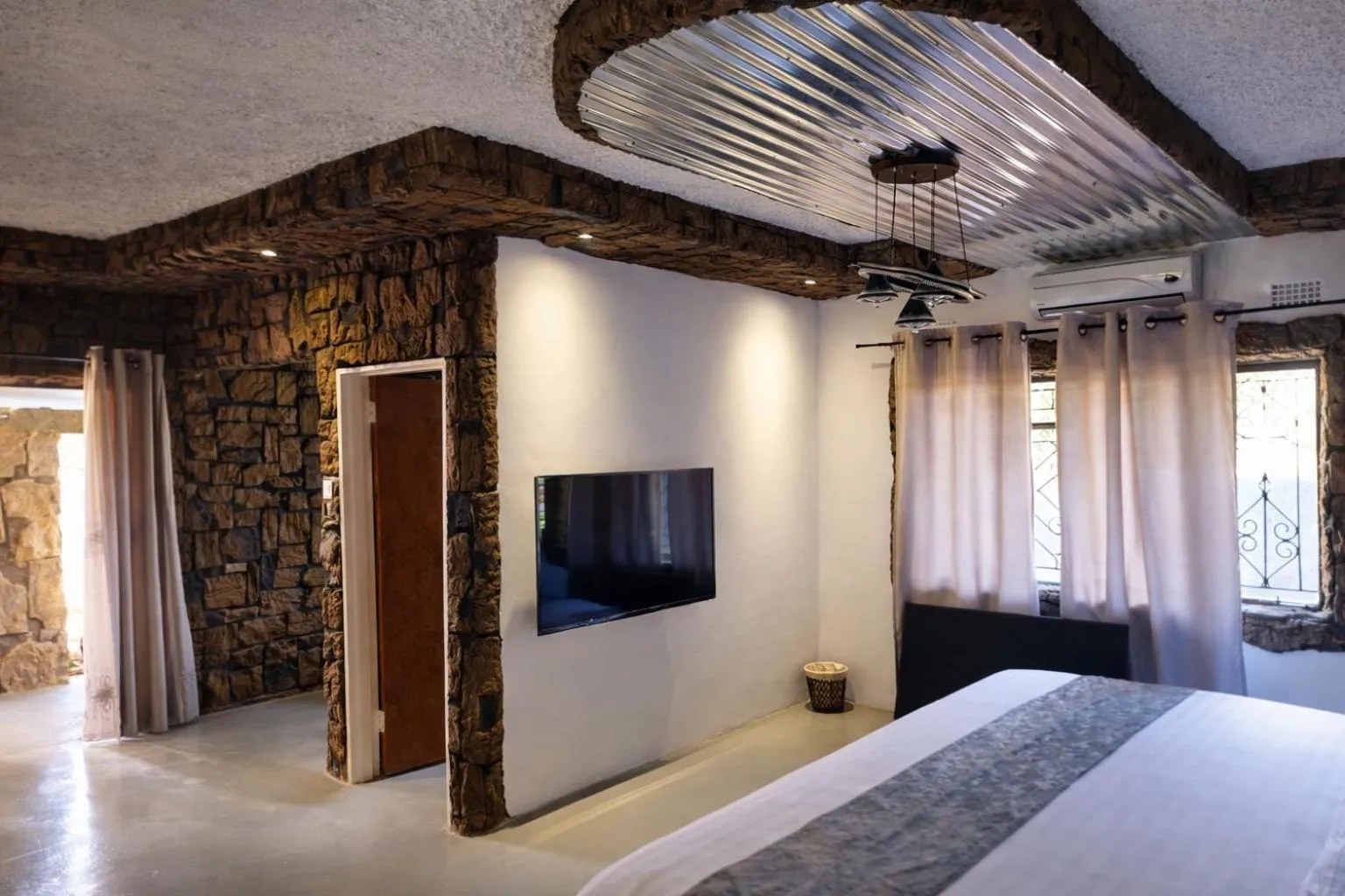 Bed in Rustiek Hotel