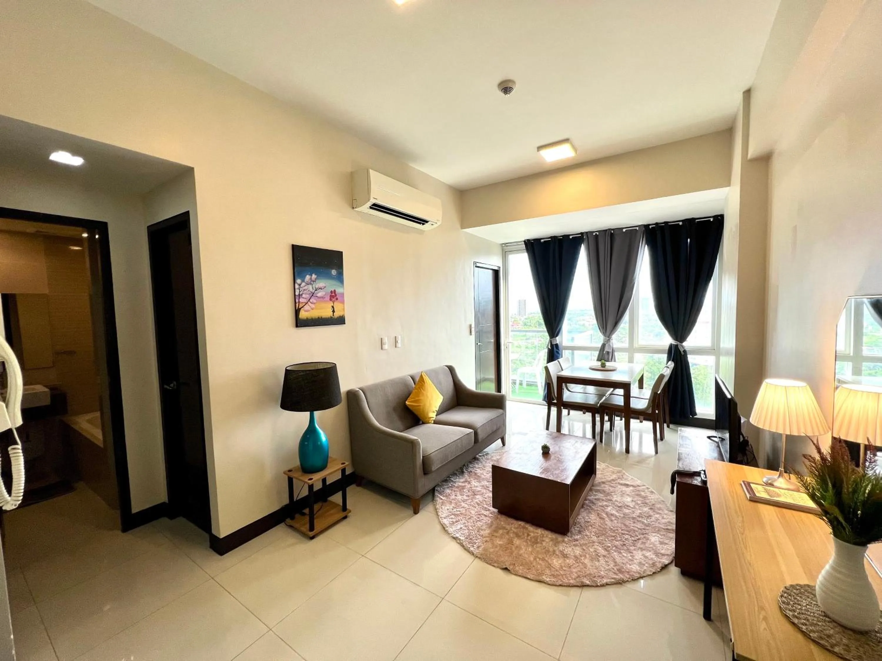 TV and multimedia in Mactan Newtown A by Isla Stays