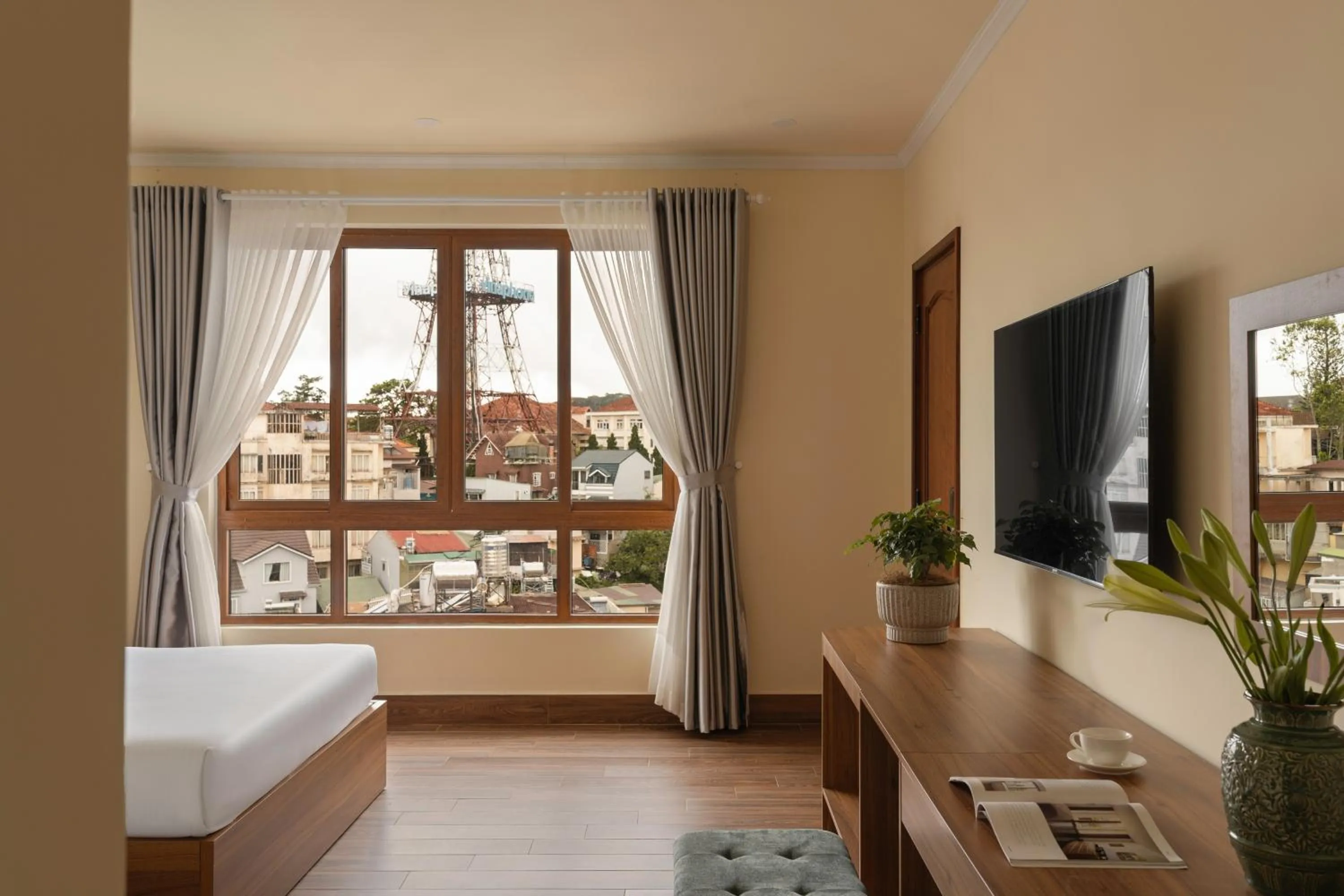 Photo of the whole room, Bed in Lumina Hotel Da Lat Central