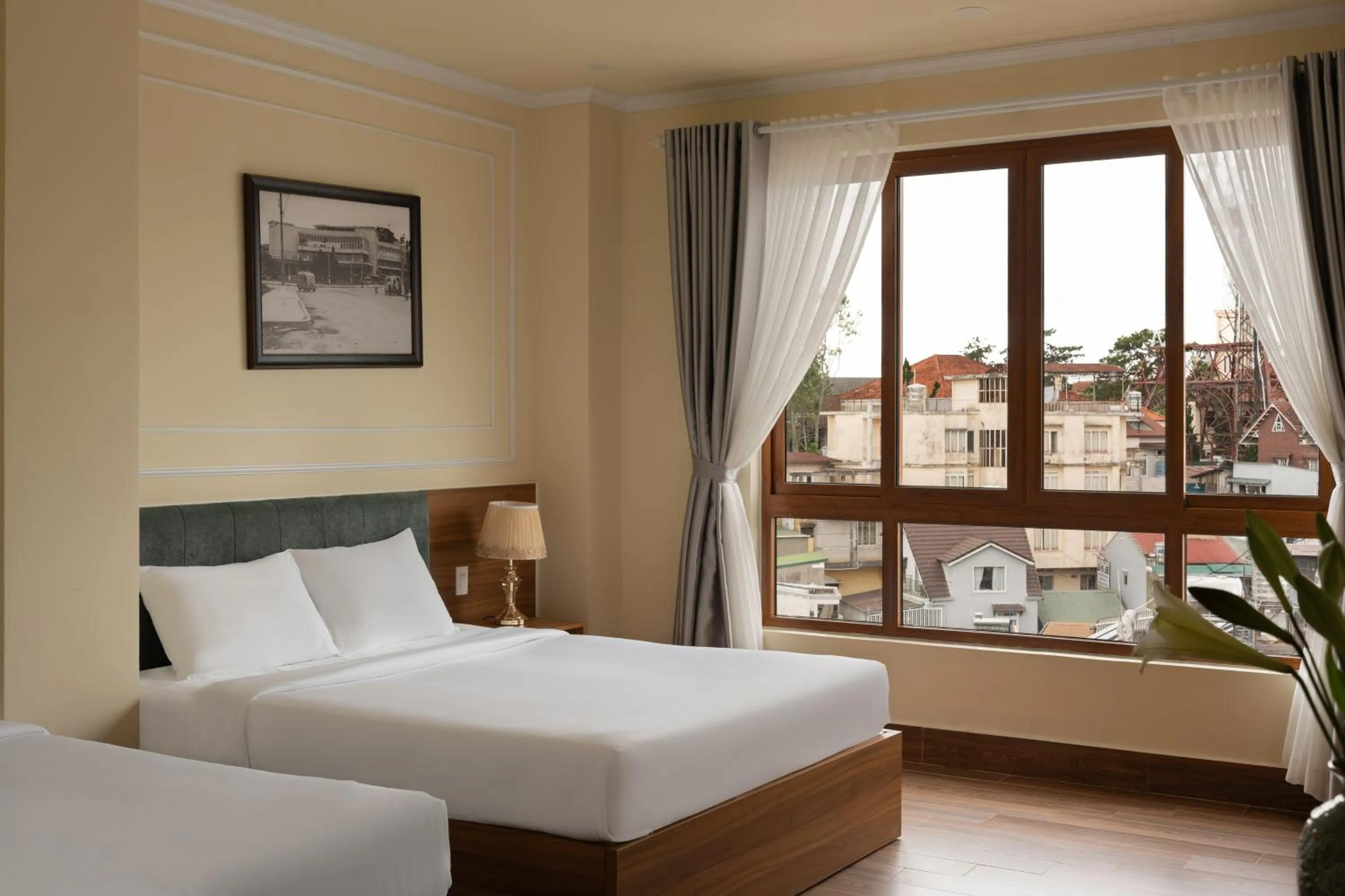 Photo of the whole room, Bed in Lumina Hotel Da Lat Central