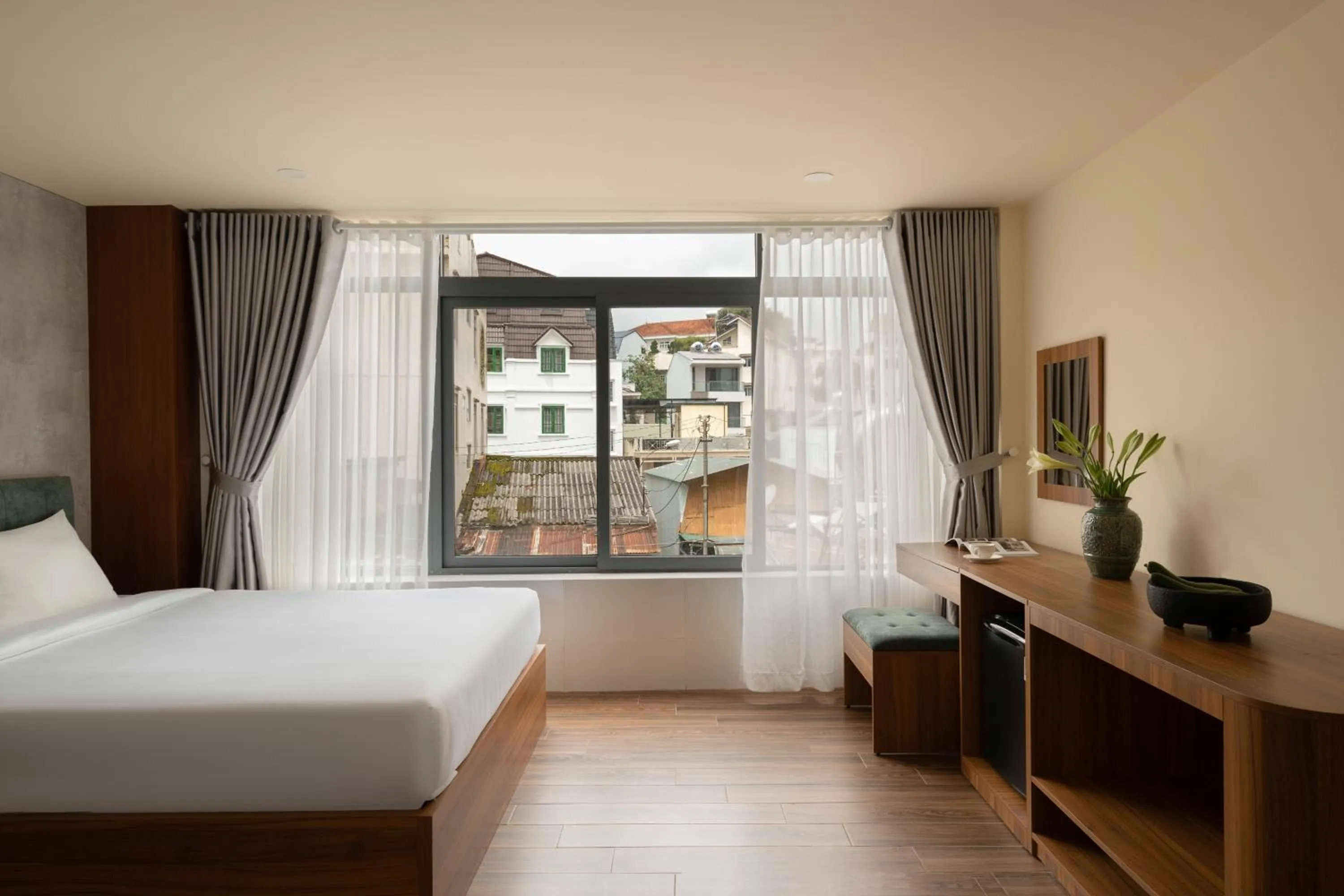 Photo of the whole room, Bed in Lumina Hotel Da Lat Central