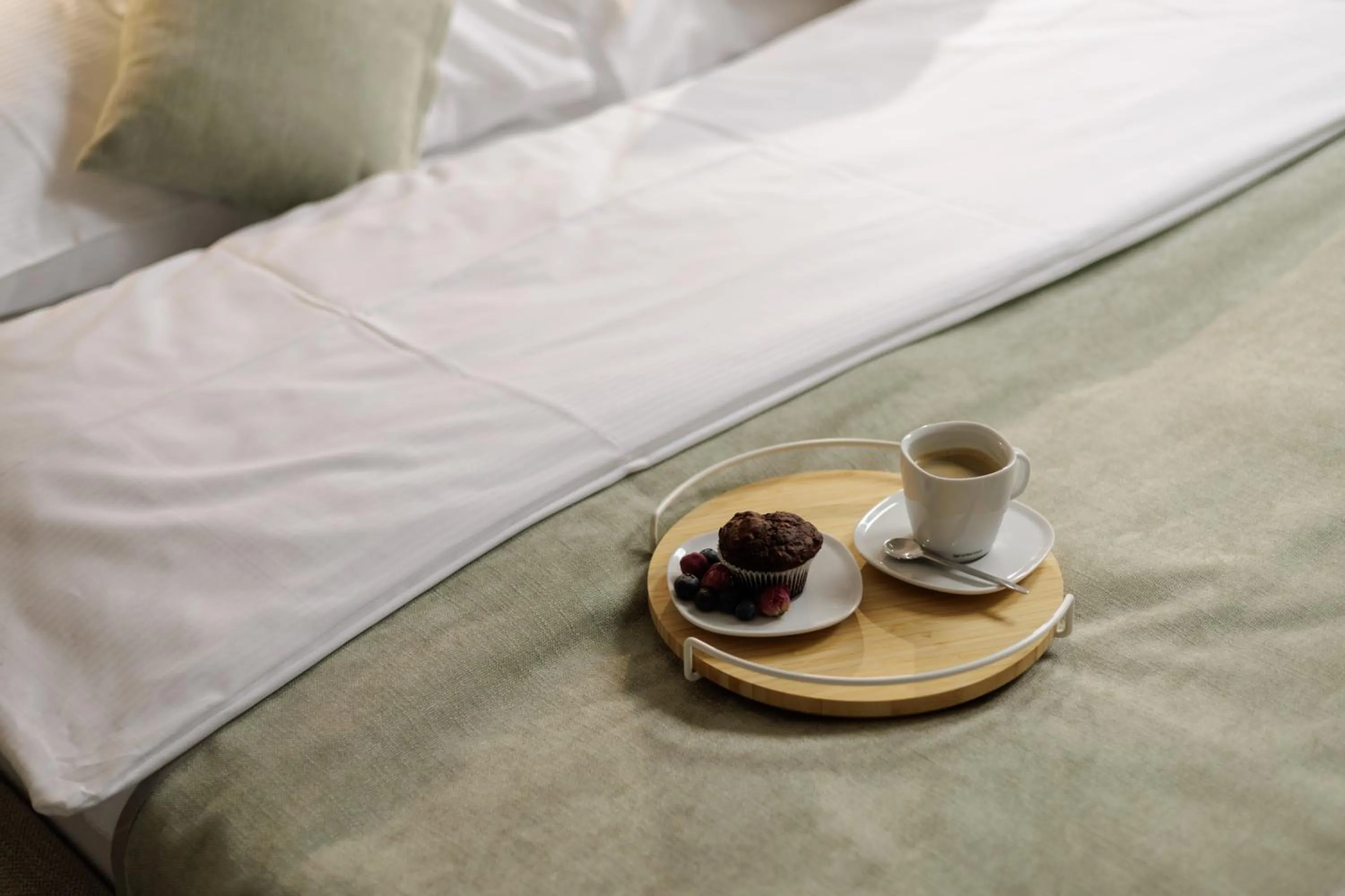 Bed in River Apartments