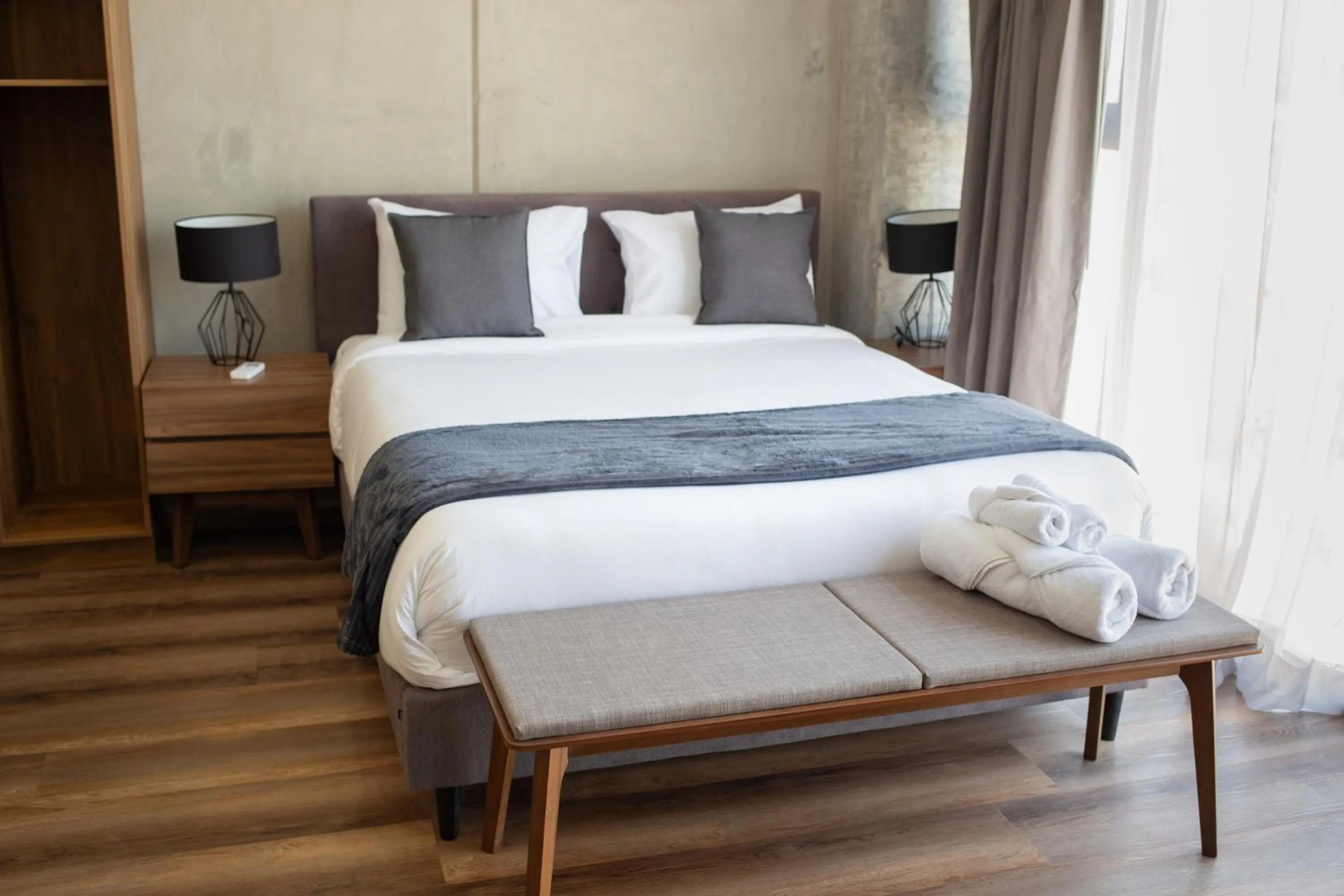 Bed in Suites del Carmen Consulado