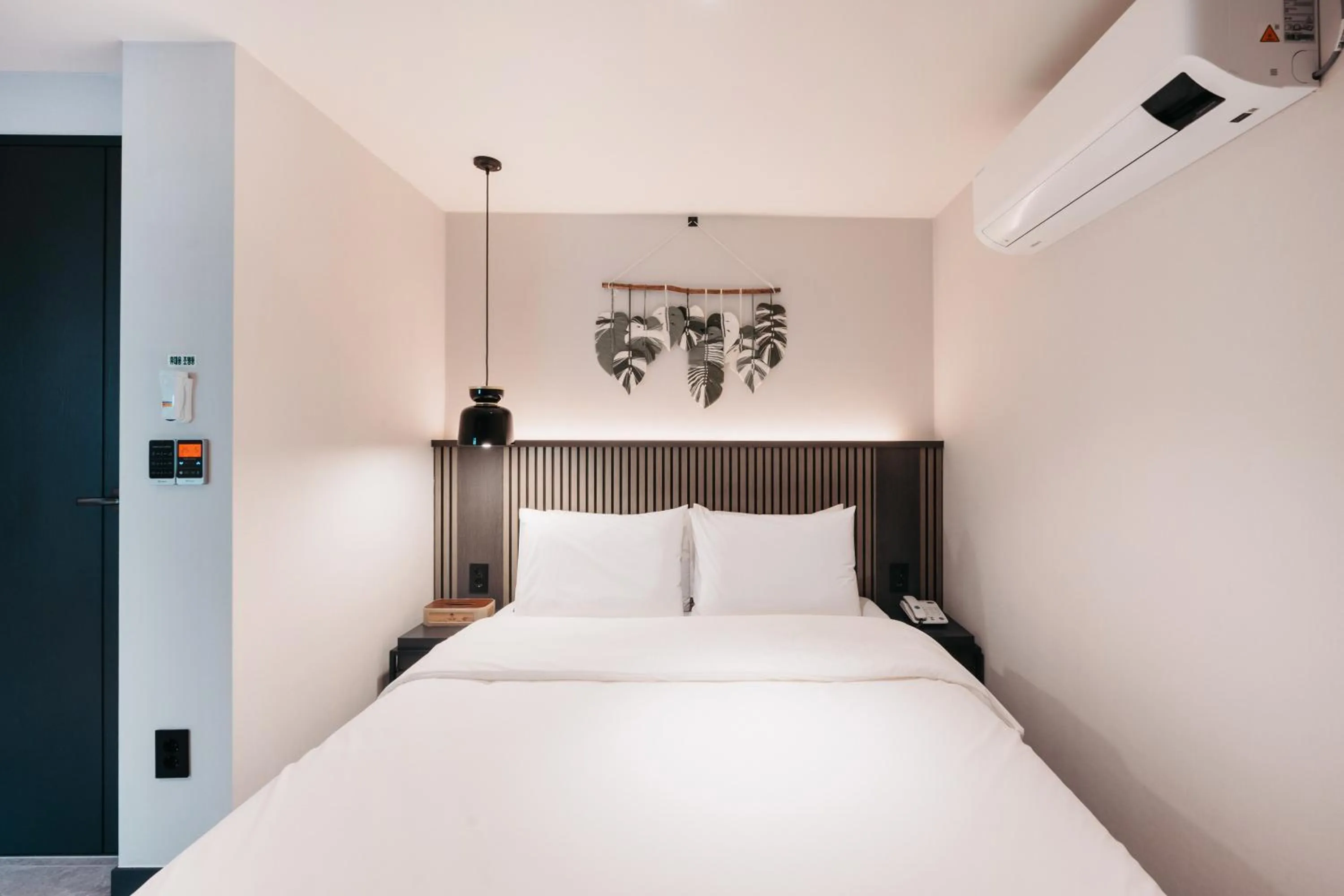 Bed in Cozy Tree Hotel Seomyeon