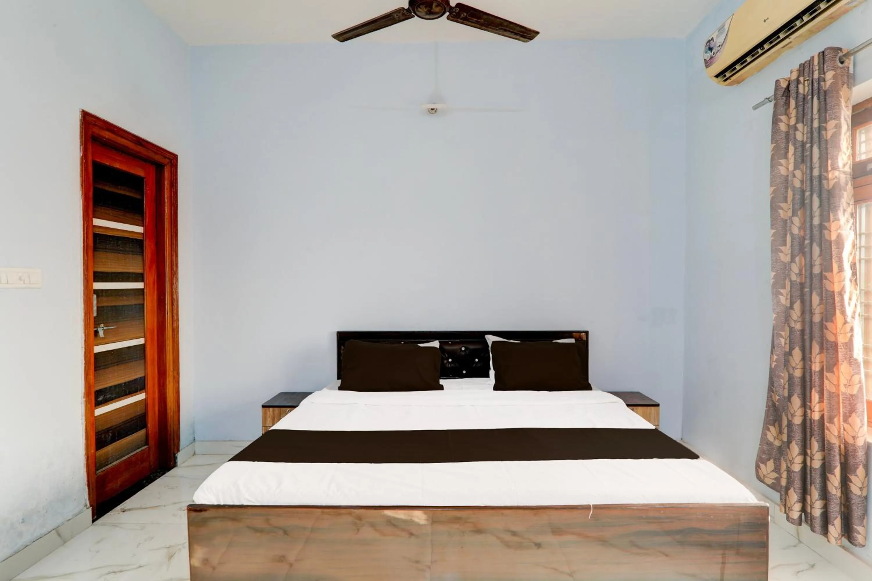 Bedroom in HOTEL O BLISS INN GUEST HOUSE