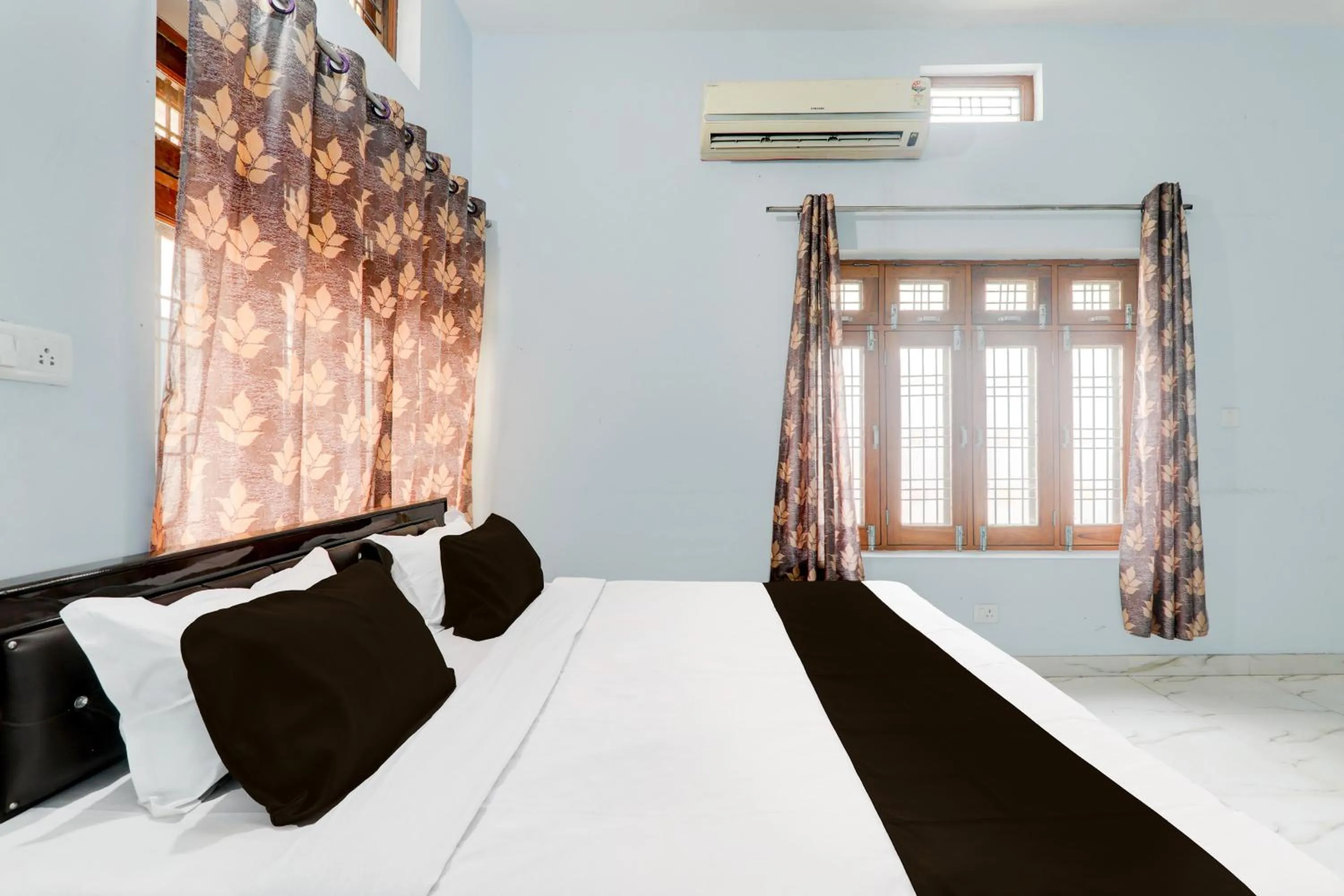 Bedroom in HOTEL O BLISS INN GUEST HOUSE