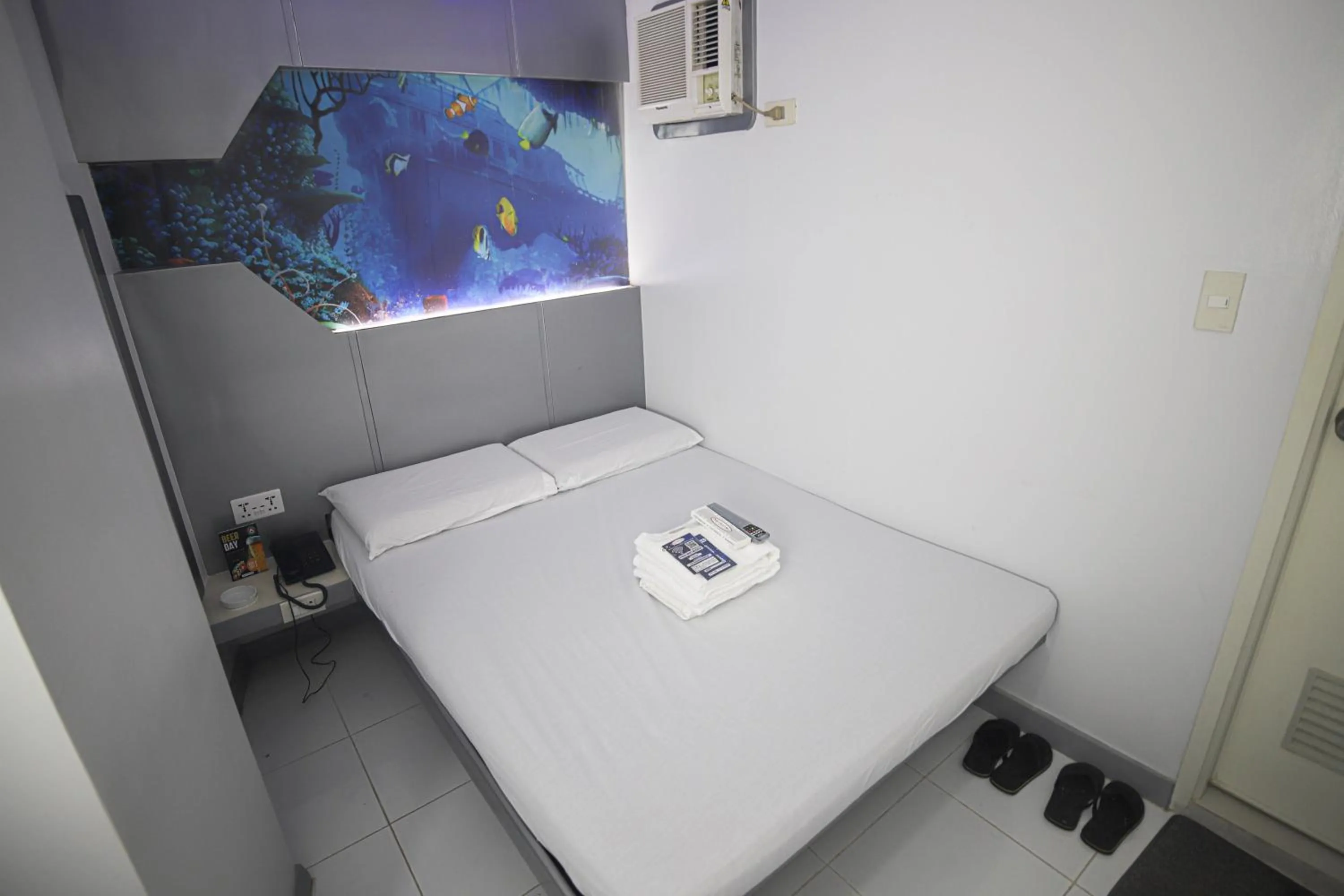 Bed in Astrotel Calamba