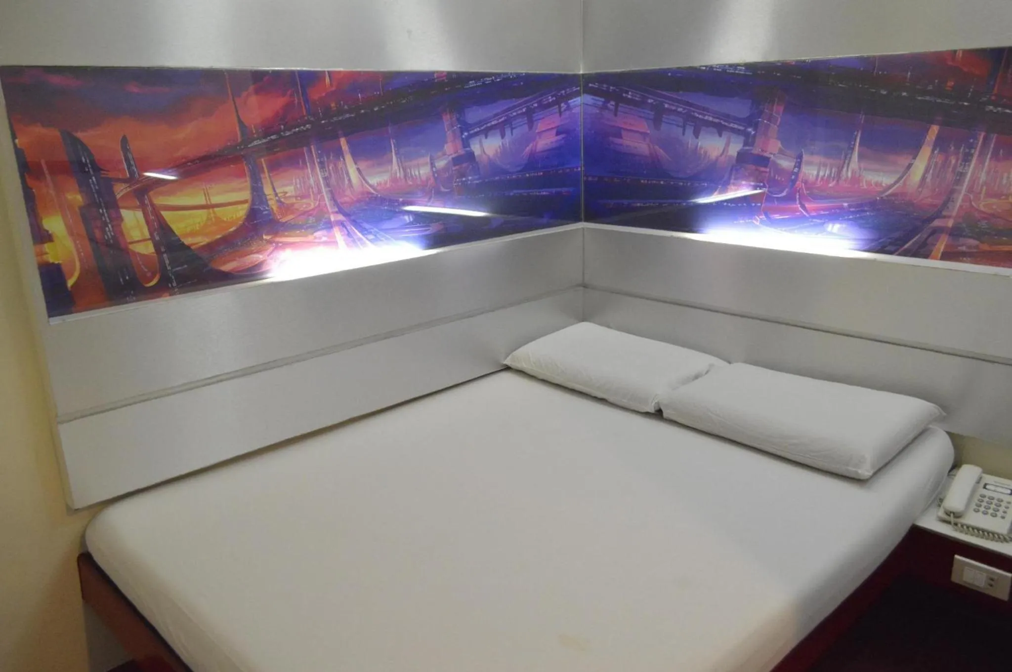 Bed in Astrotel Calamba