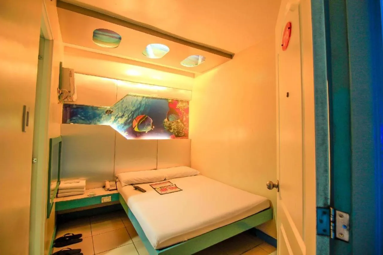 Bed in Astrotel Calamba