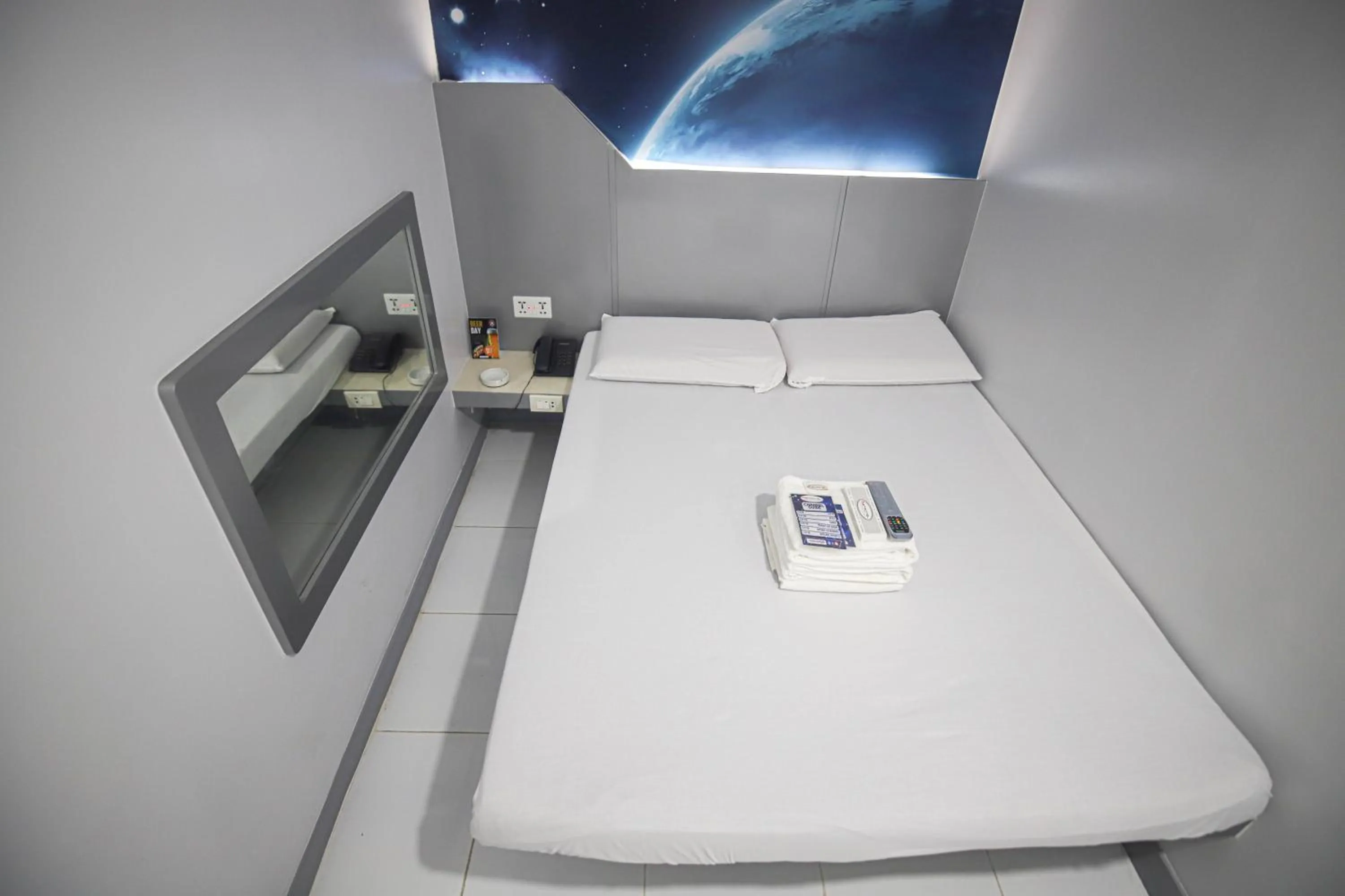 Bed in Astrotel Calamba