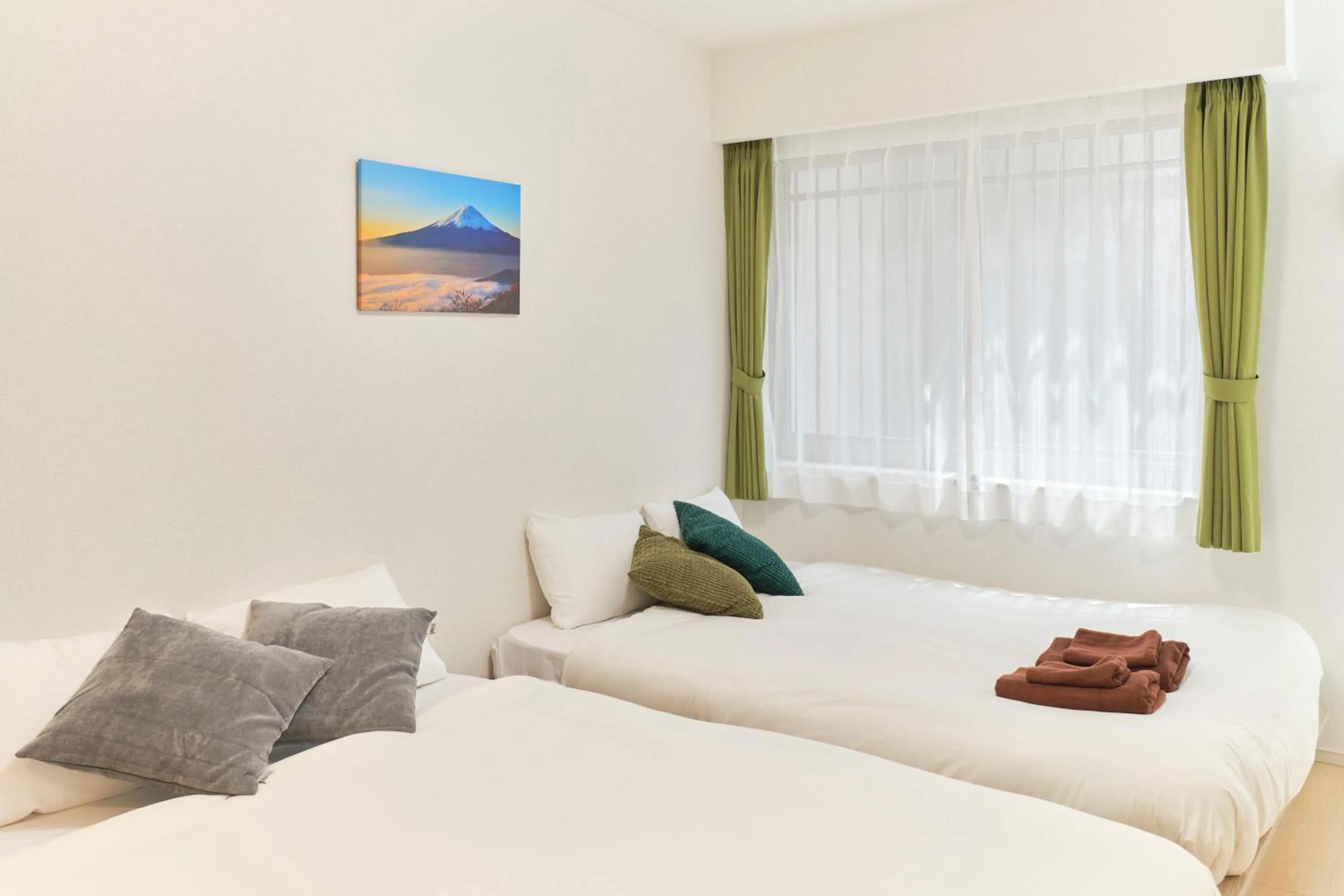 Bed in J-ARC Akebonobashi by Tranova