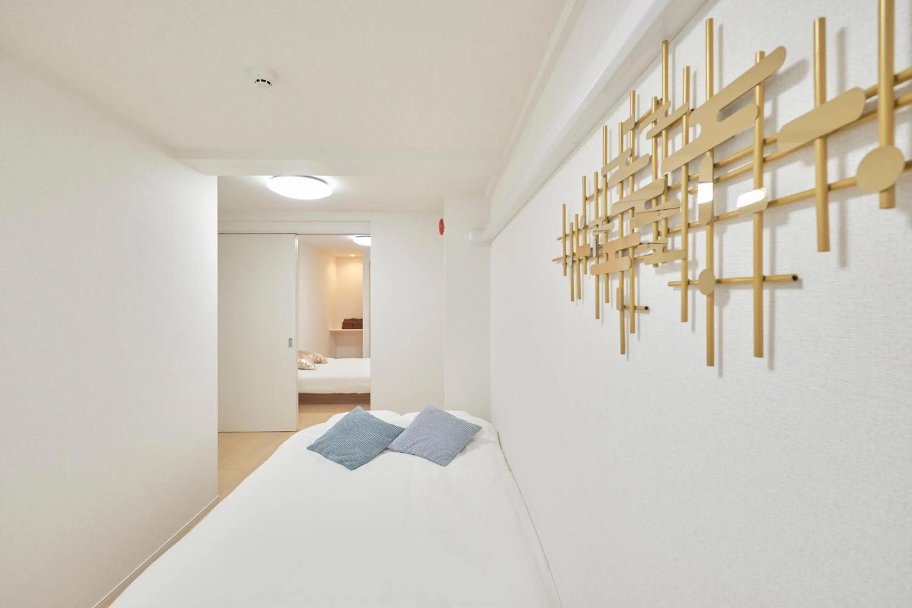 Bed in J-ARC Akebonobashi by Tranova