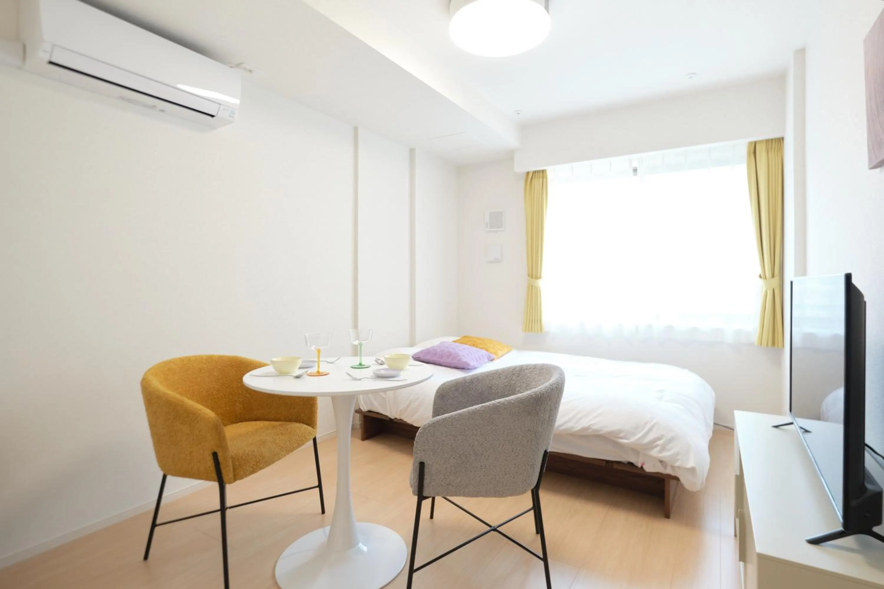 Bed in J-ARC Akebonobashi by Tranova