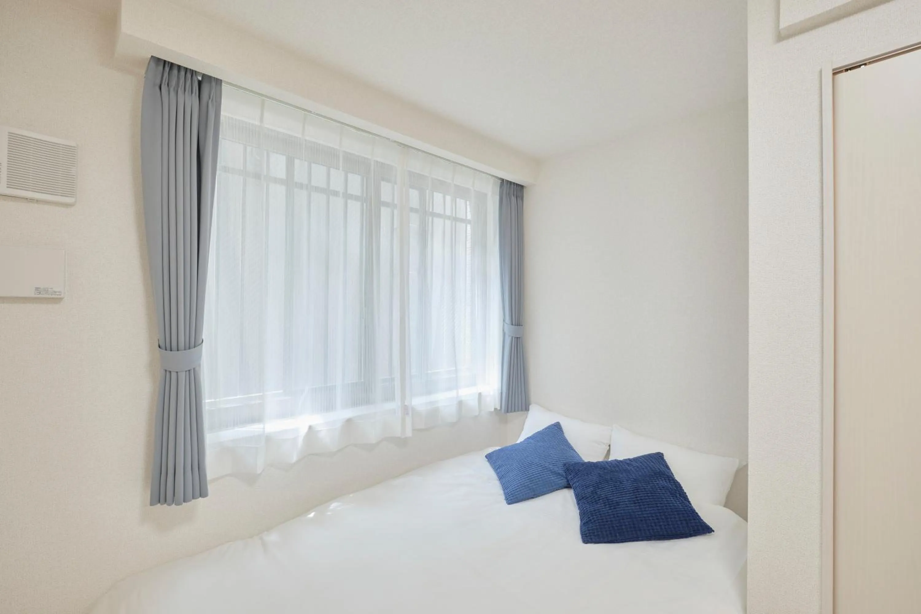 Bed in J-ARC Akebonobashi by Tranova