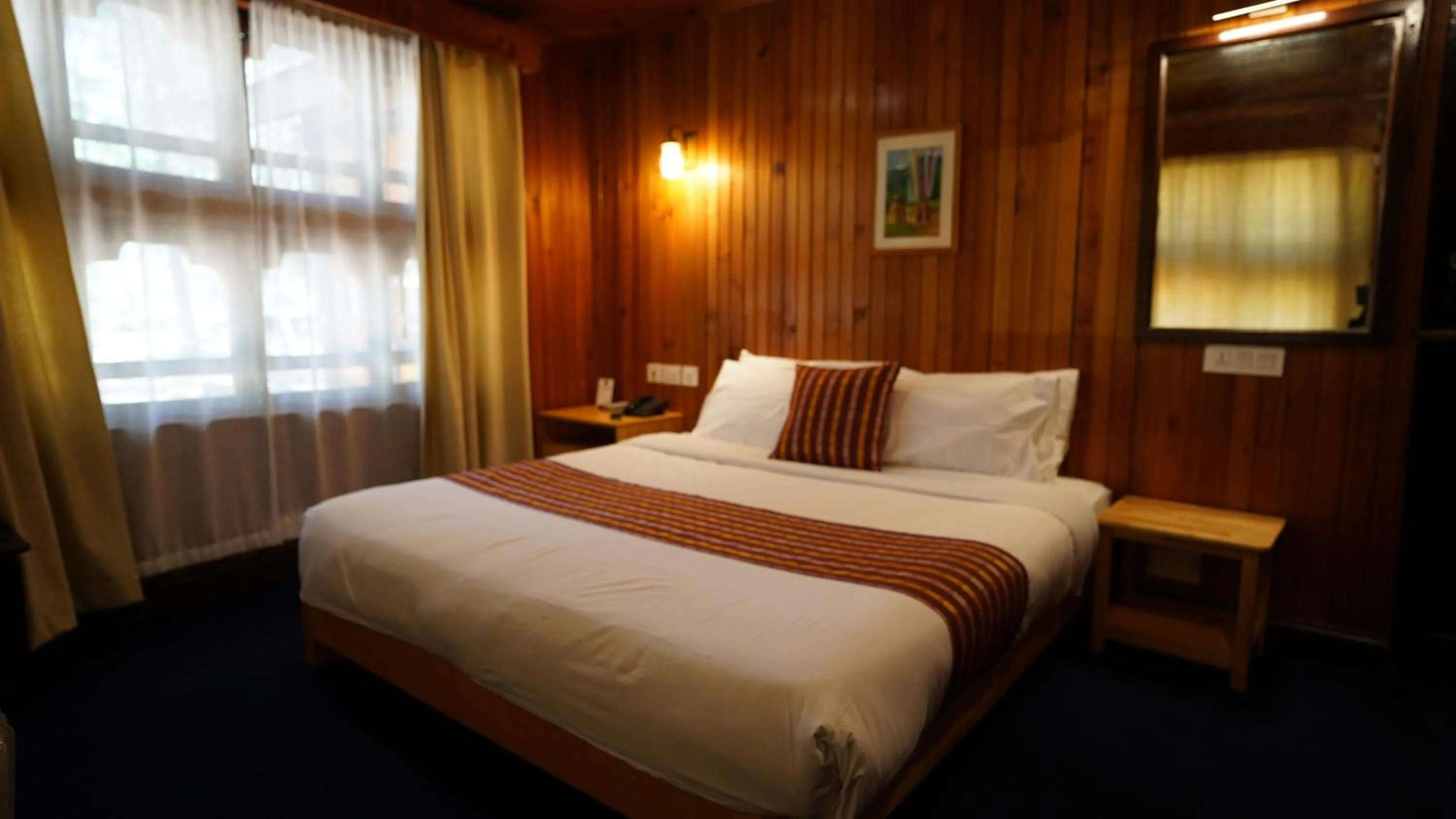 Bed in Hotel Olathang