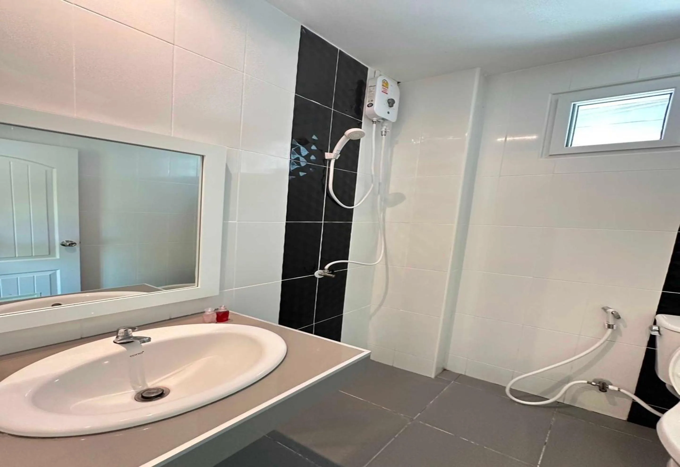 Bathroom in OYO 75492 Carpe Diem Homestay