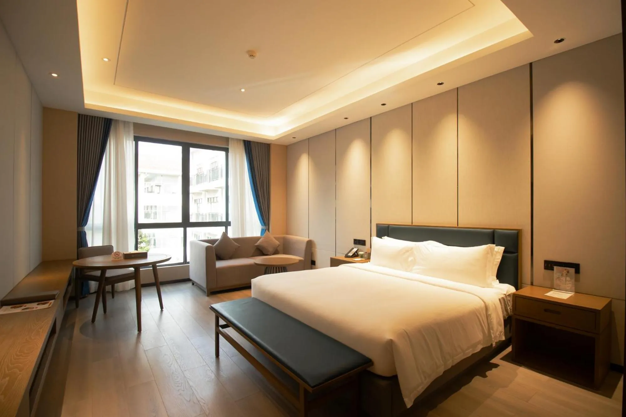 Photo of the whole room, Bed in DongHu Resort Hotel