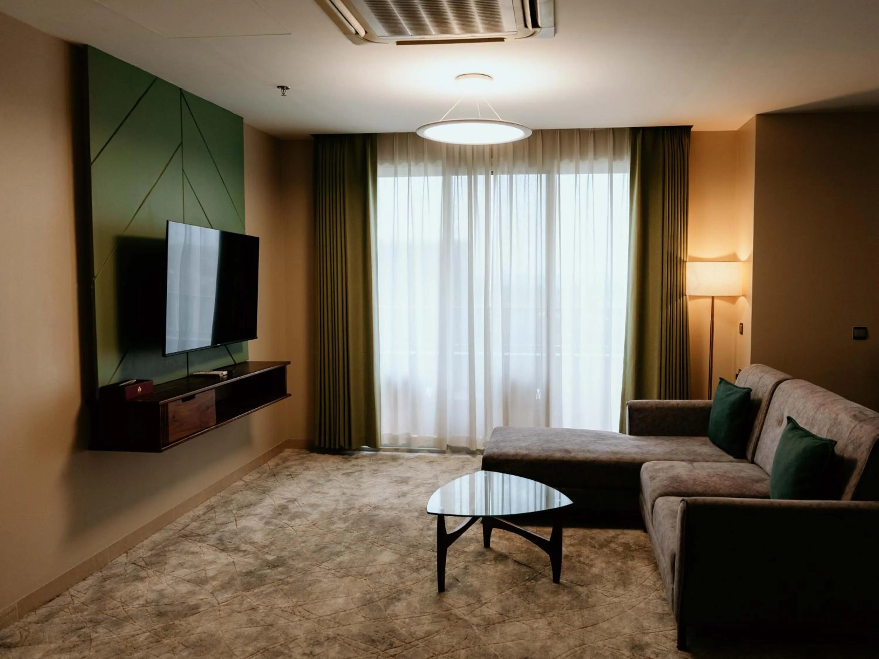 TV and multimedia in Kingjada Hotels & Apartments