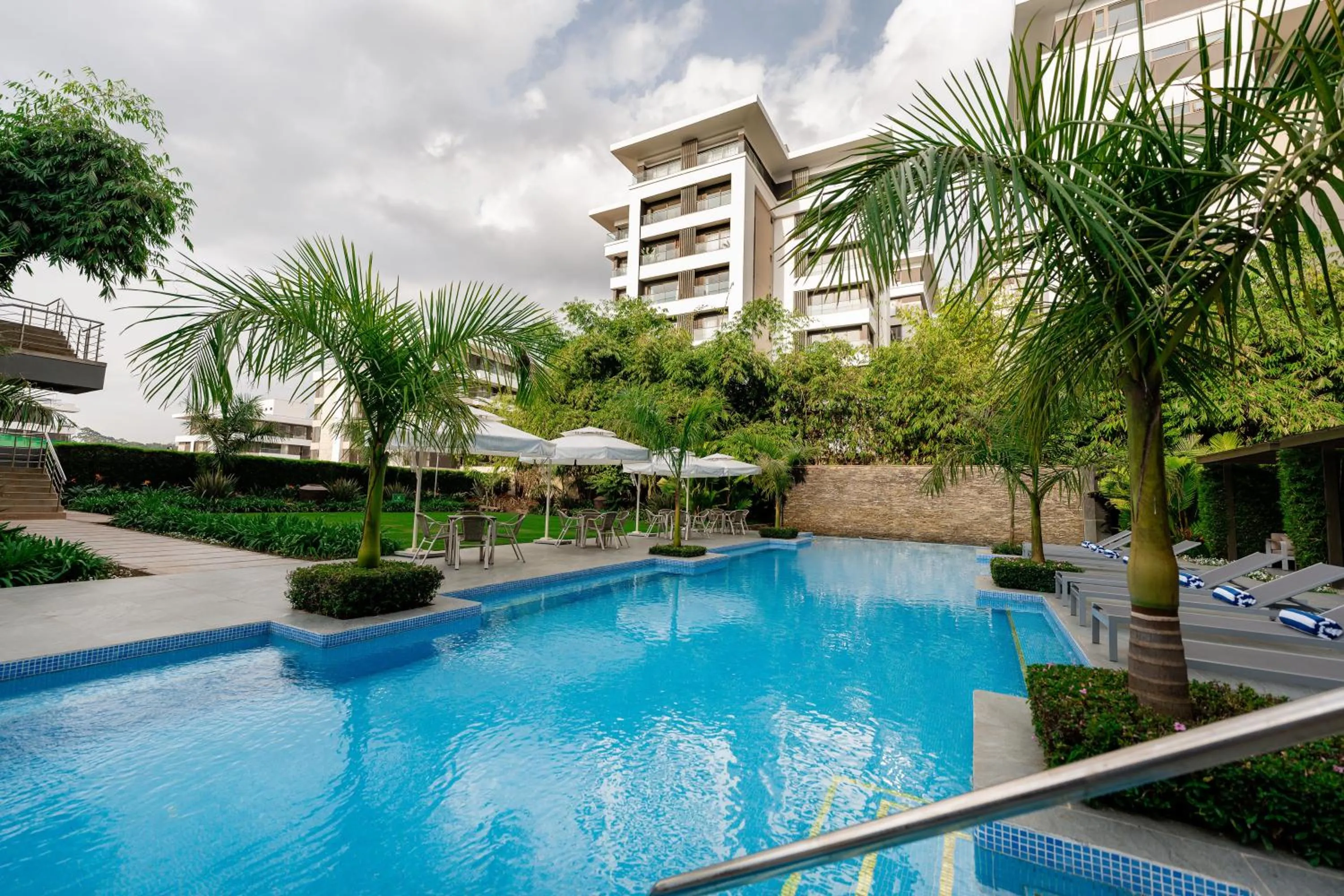 Swimming pool in Trademark Suites at Enaki Town