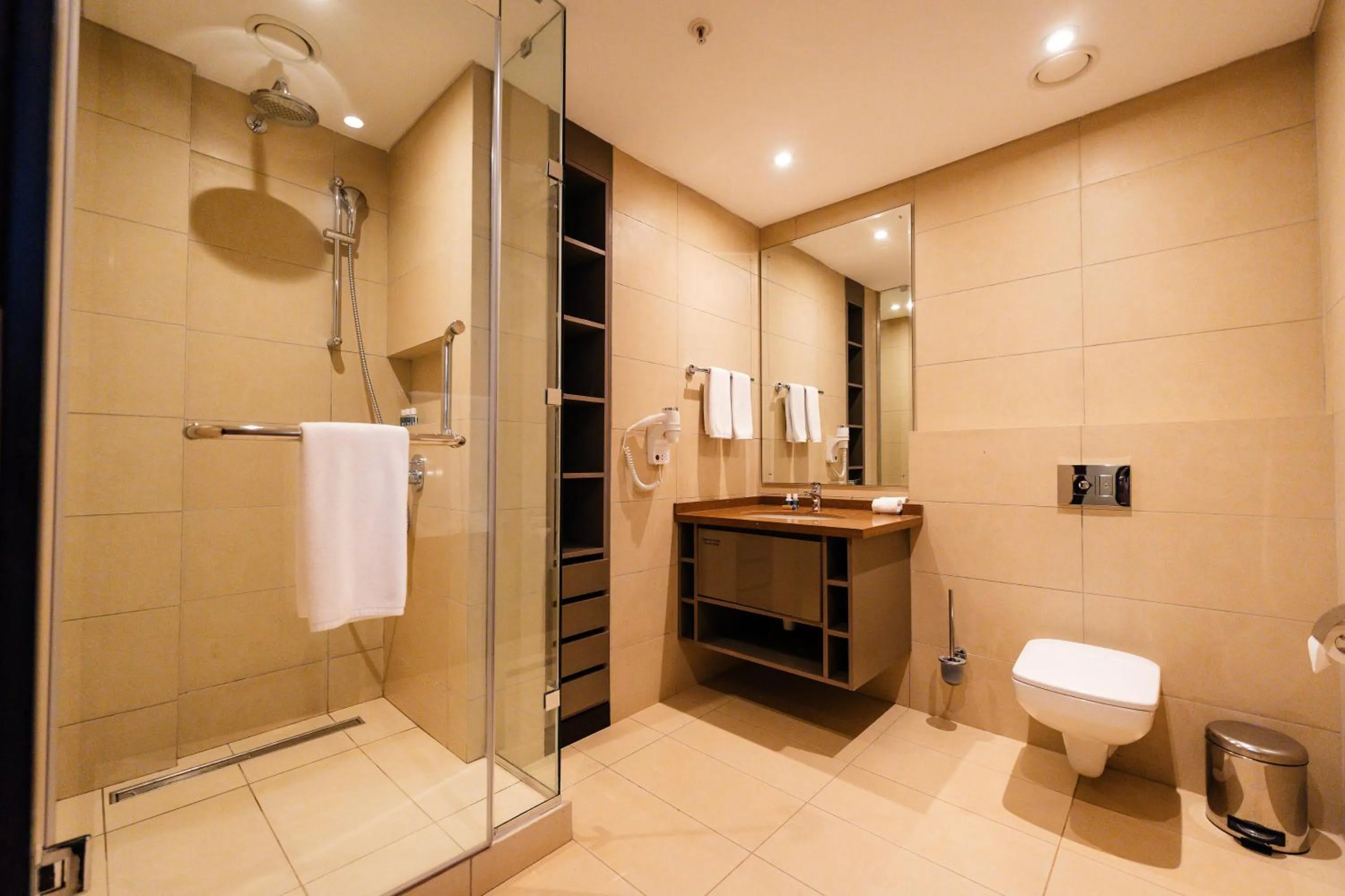 Bathroom in Trademark Suites at Enaki Town