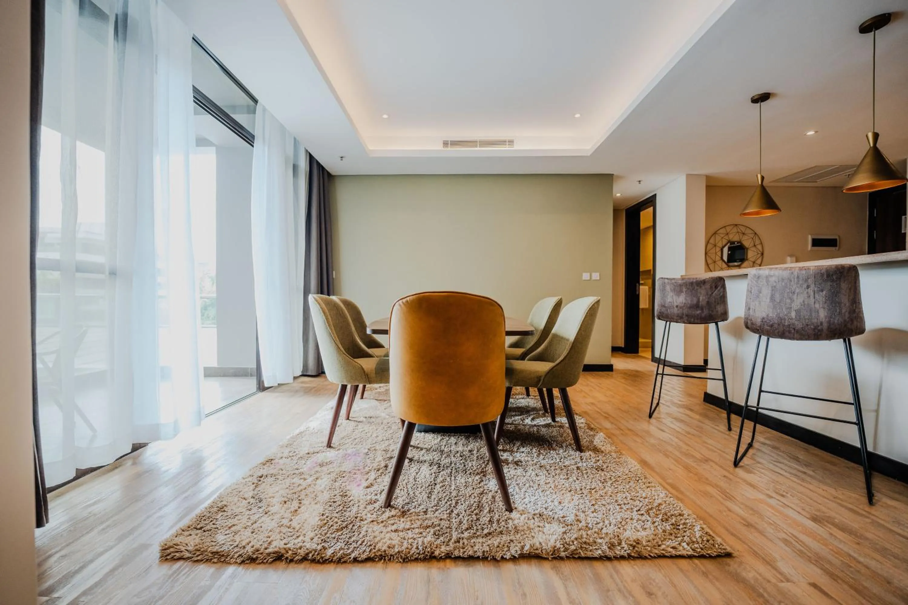 Dining area in Trademark Suites at Enaki Town