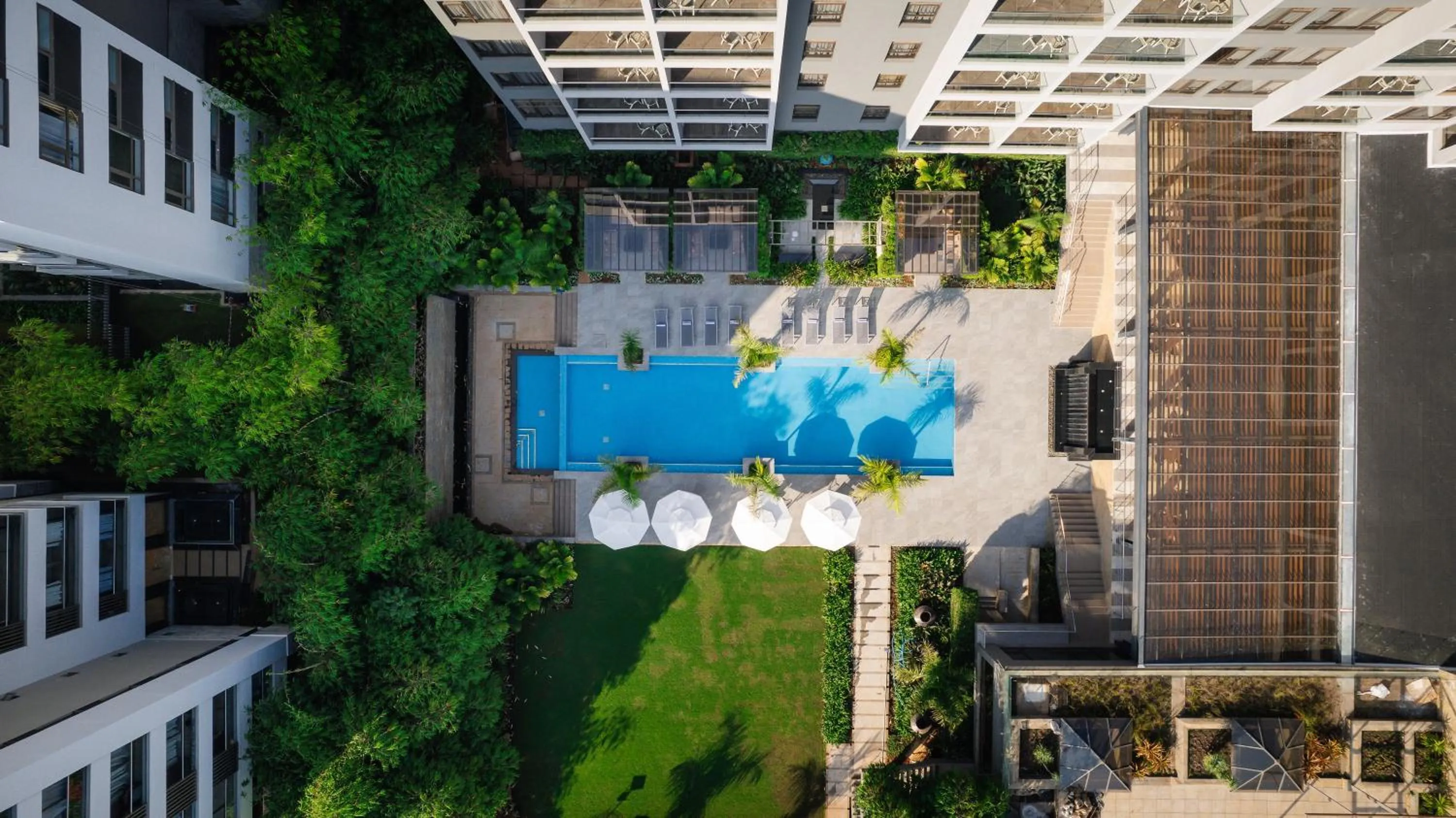 Swimming pool in Trademark Suites at Enaki Town