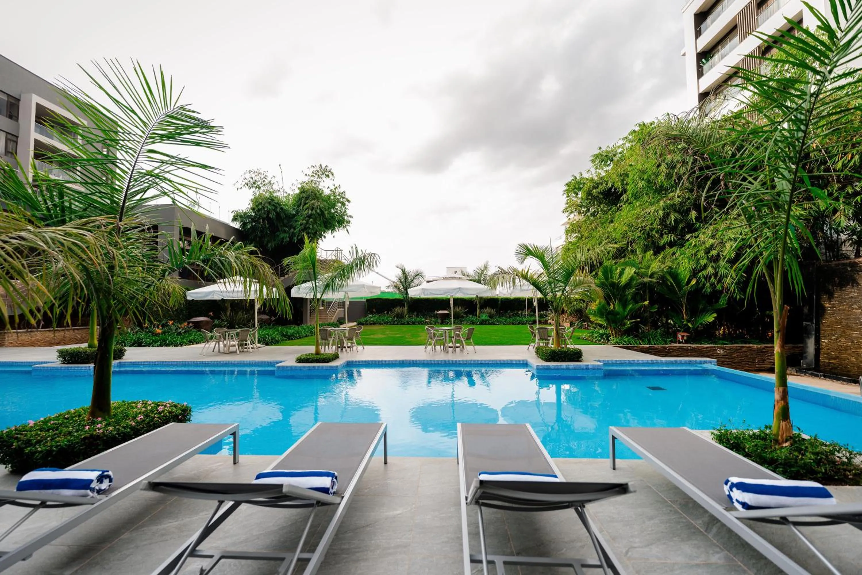 Swimming pool in Trademark Suites at Enaki Town
