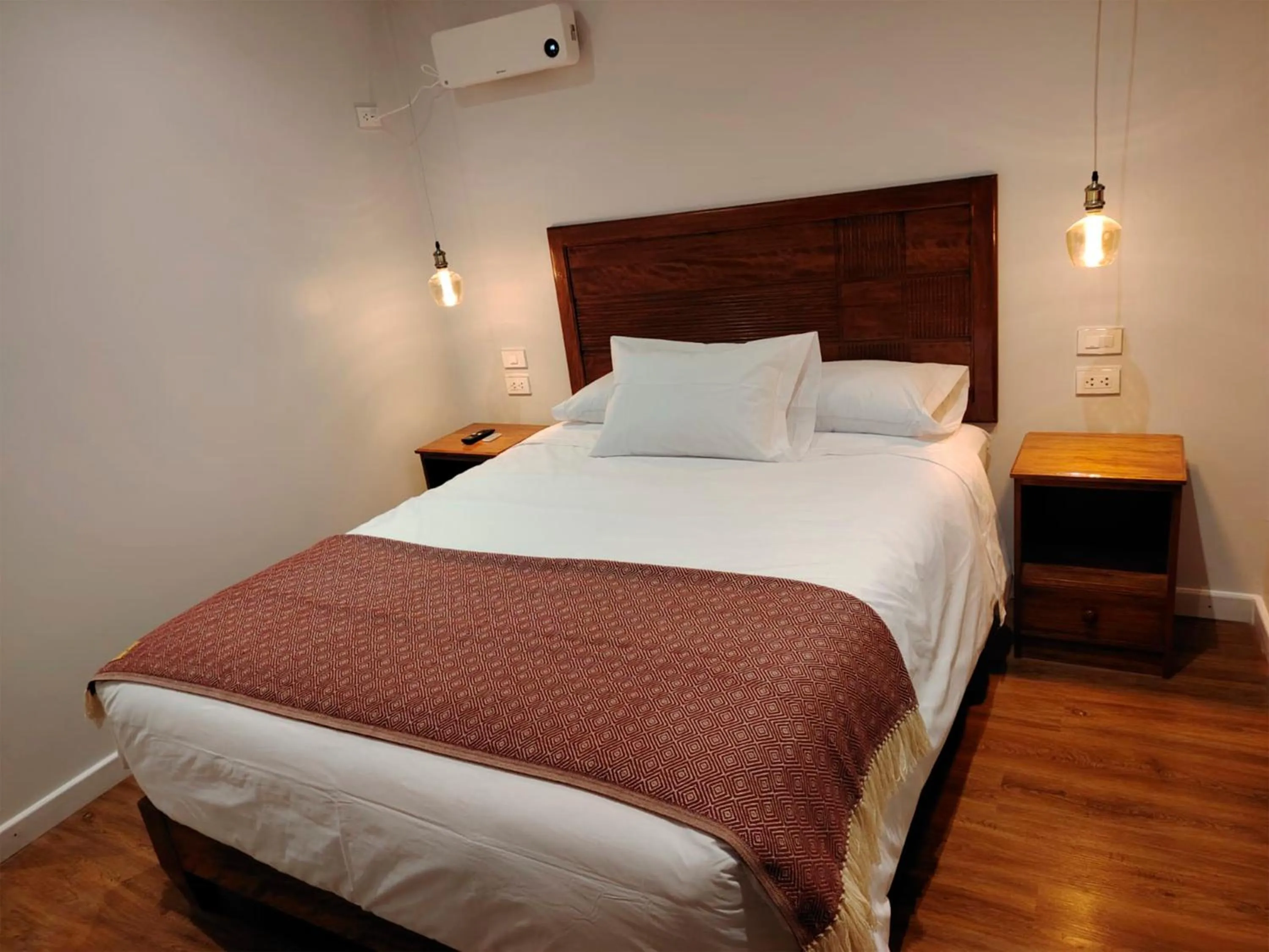 Bed in Casa Cruz Verde by Peru Garden Hotels