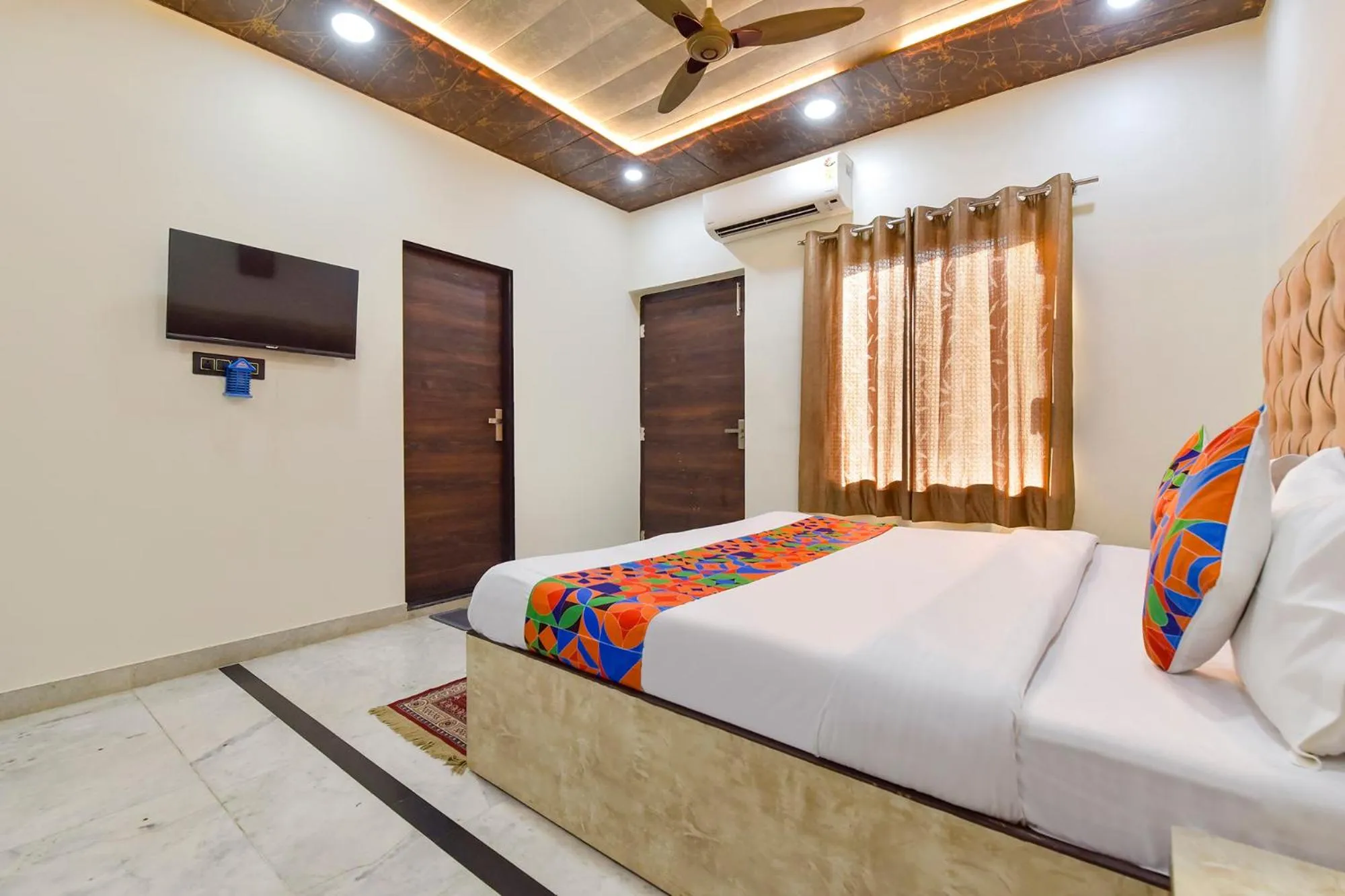 Bed in FabHotel Govindam Royal Stay