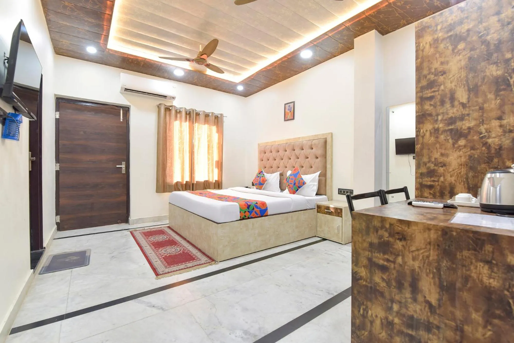 Bed in FabHotel Govindam Royal Stay