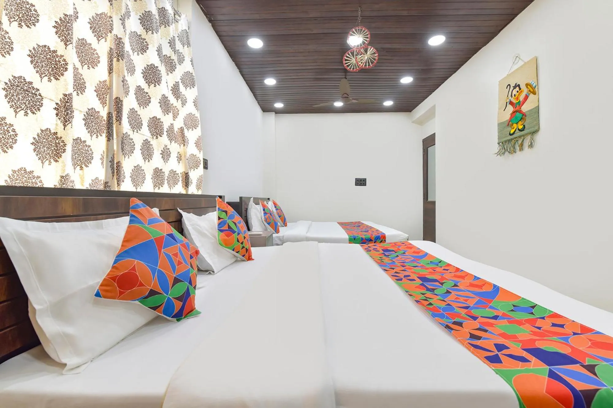 Bed in FabHotel Govindam Royal Stay