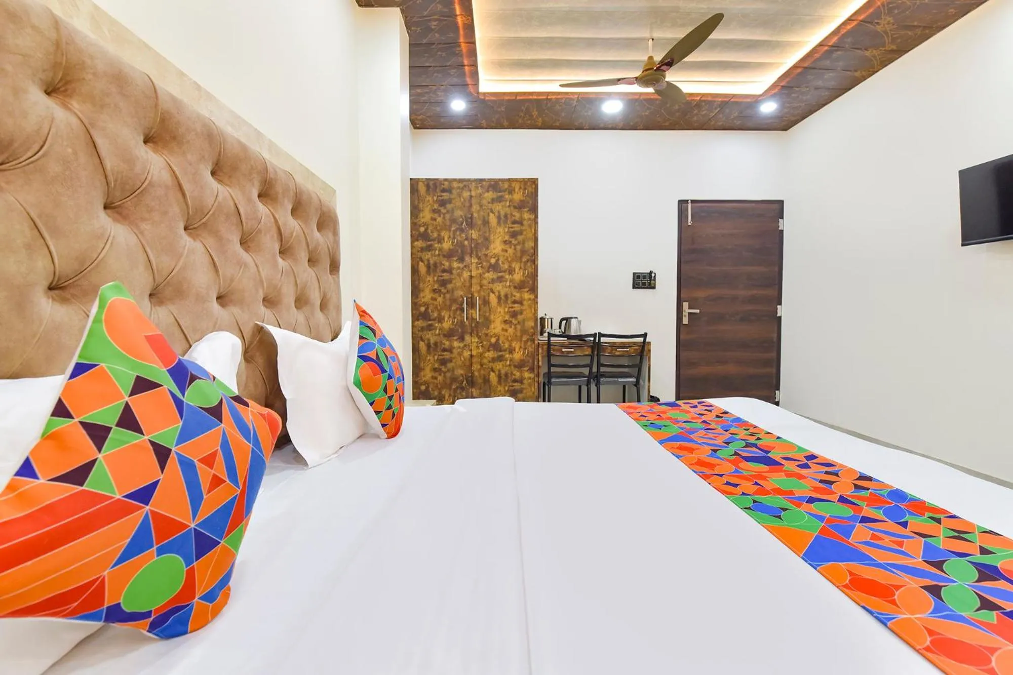 Bed in FabHotel Govindam Royal Stay