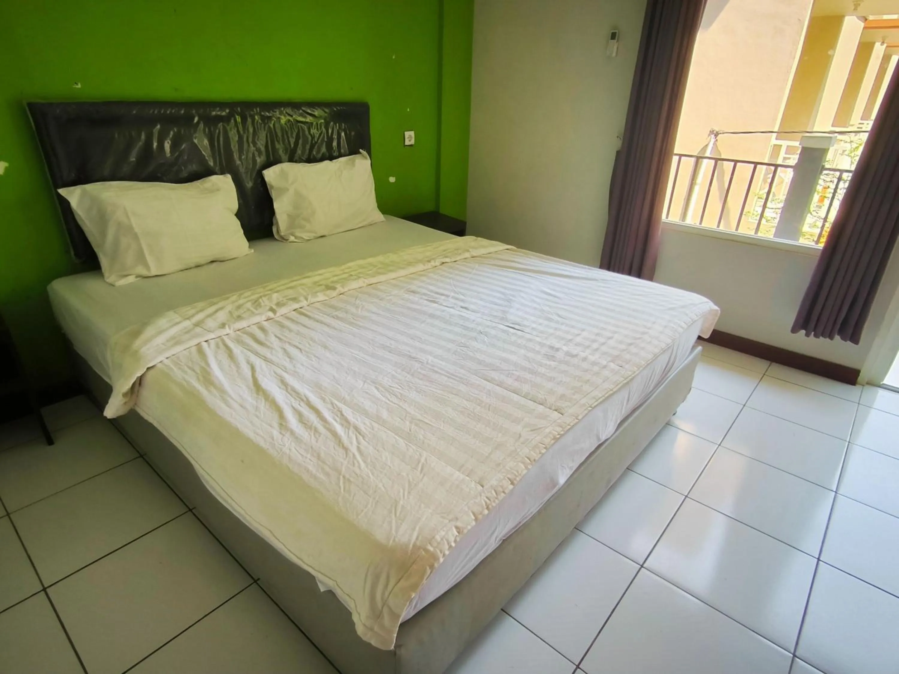 Bed in New Bandengan Beach Hotel