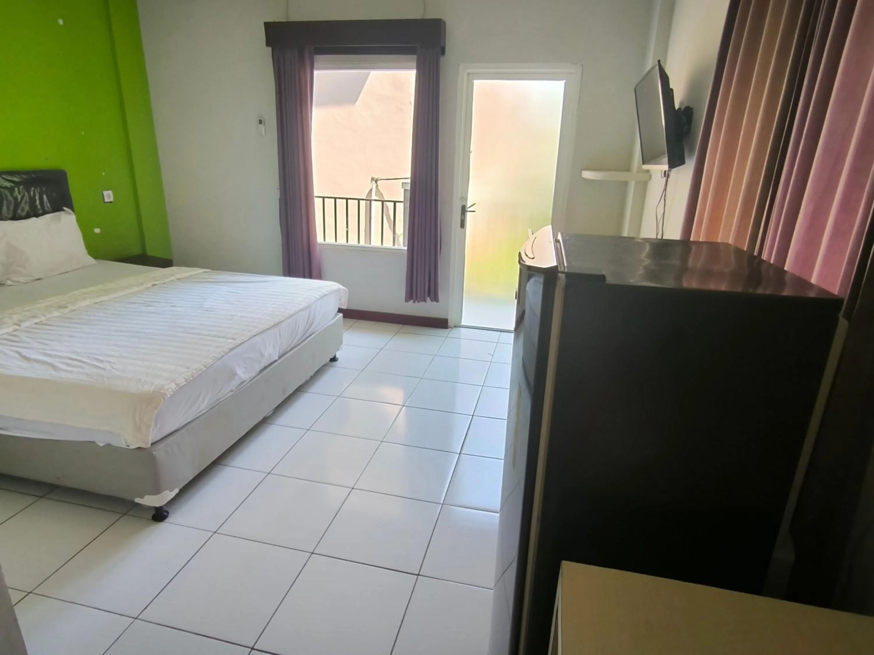 Bed in New Bandengan Beach Hotel