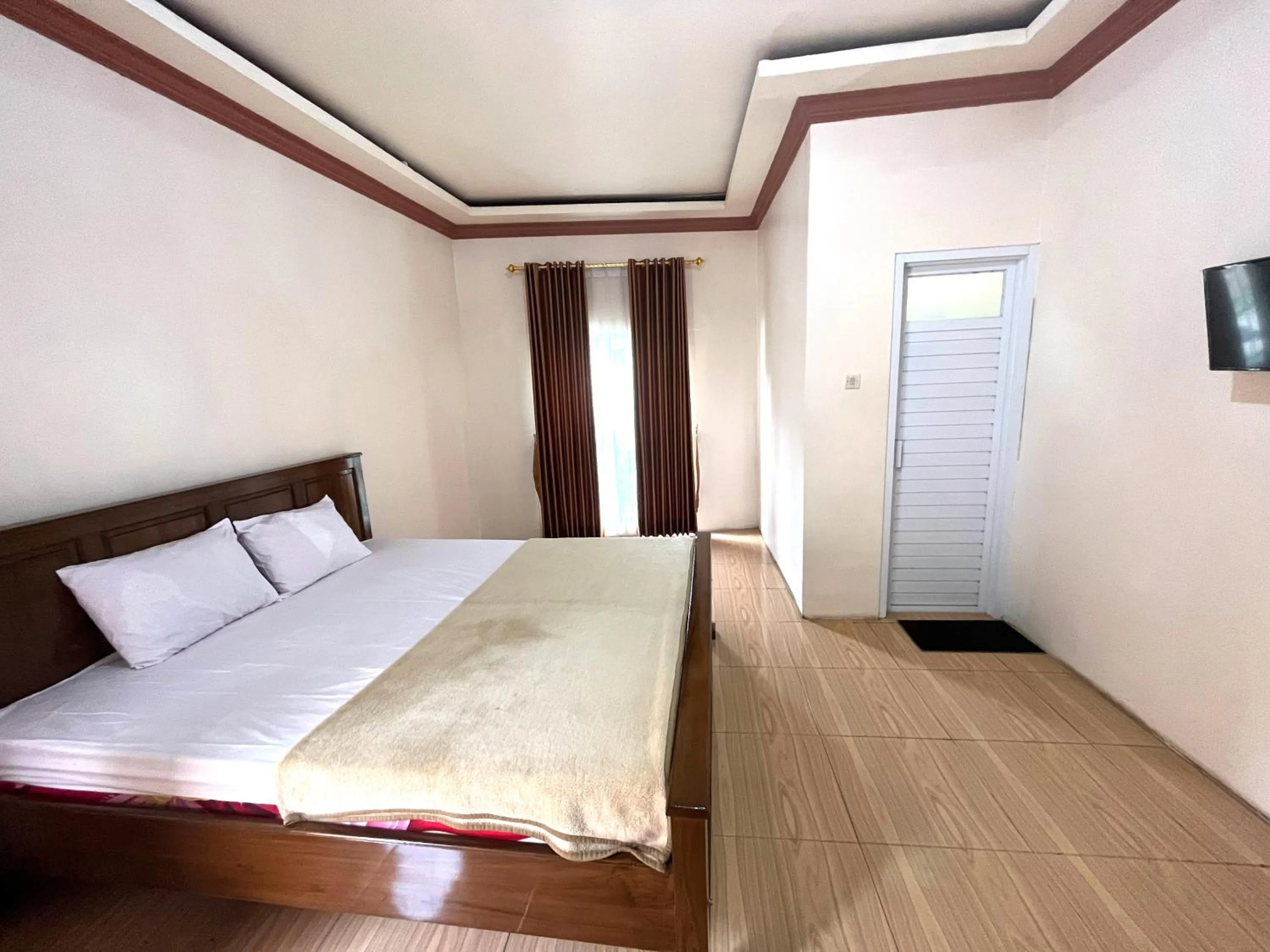 Bedroom in Rumah Bromo RedPartner