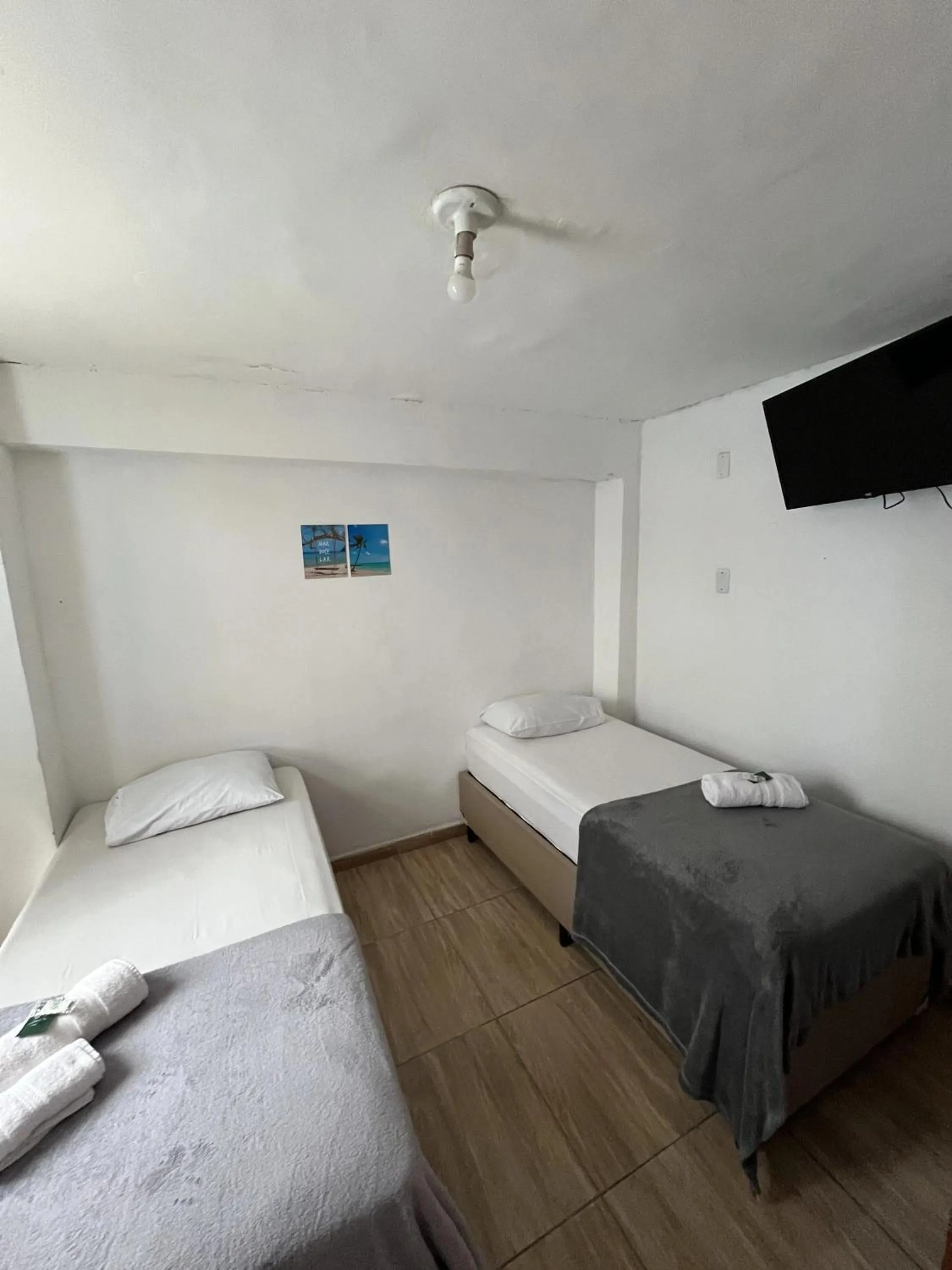Photo of the whole room, Bed in Pousada Aloha Santos