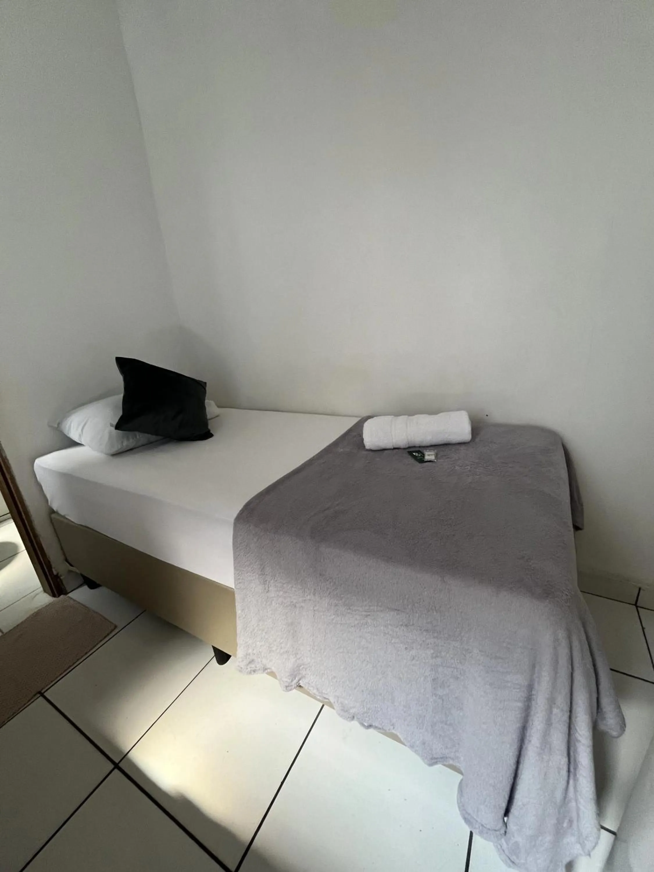 Bed in Pousada Aloha Santos