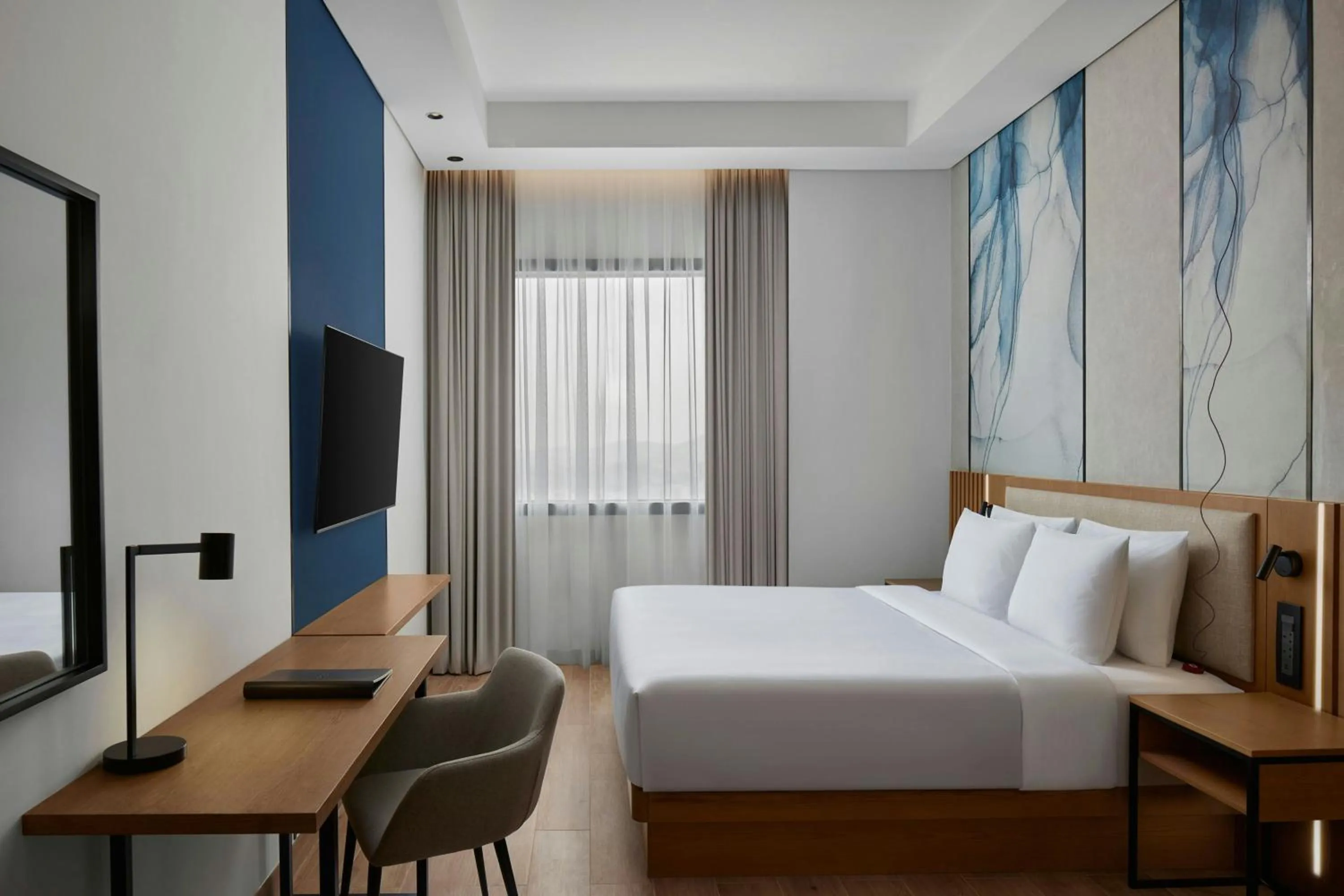 Photo of the whole room, Bed in Courtyard by Marriott Makkah