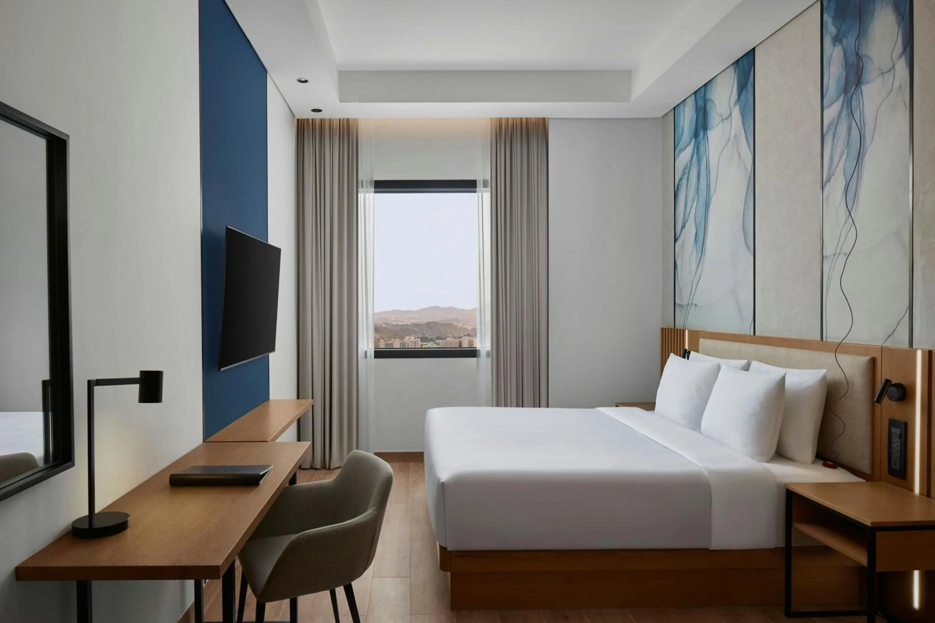 Photo of the whole room, Bed in Courtyard by Marriott Makkah