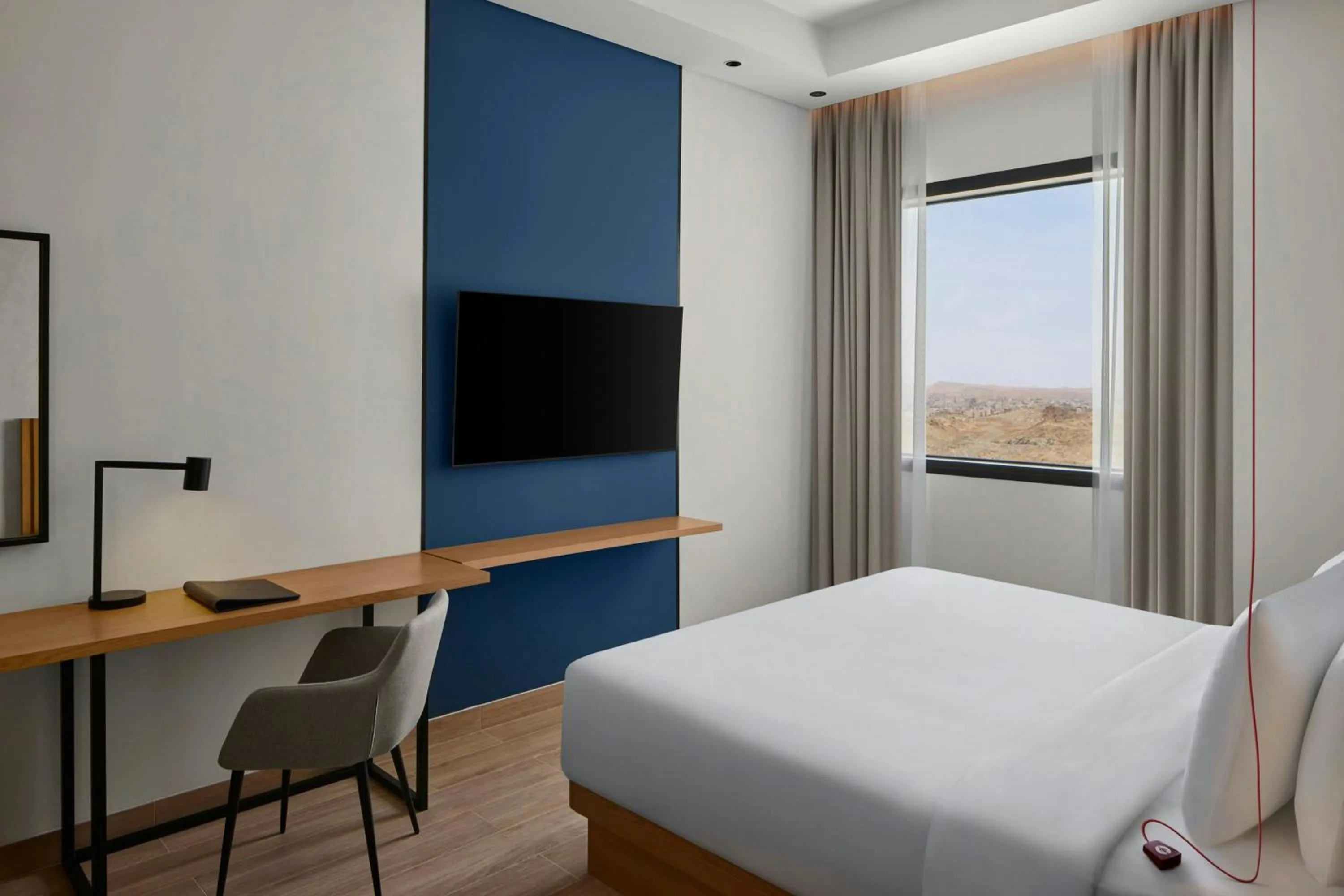 Photo of the whole room, Bed in Courtyard by Marriott Makkah