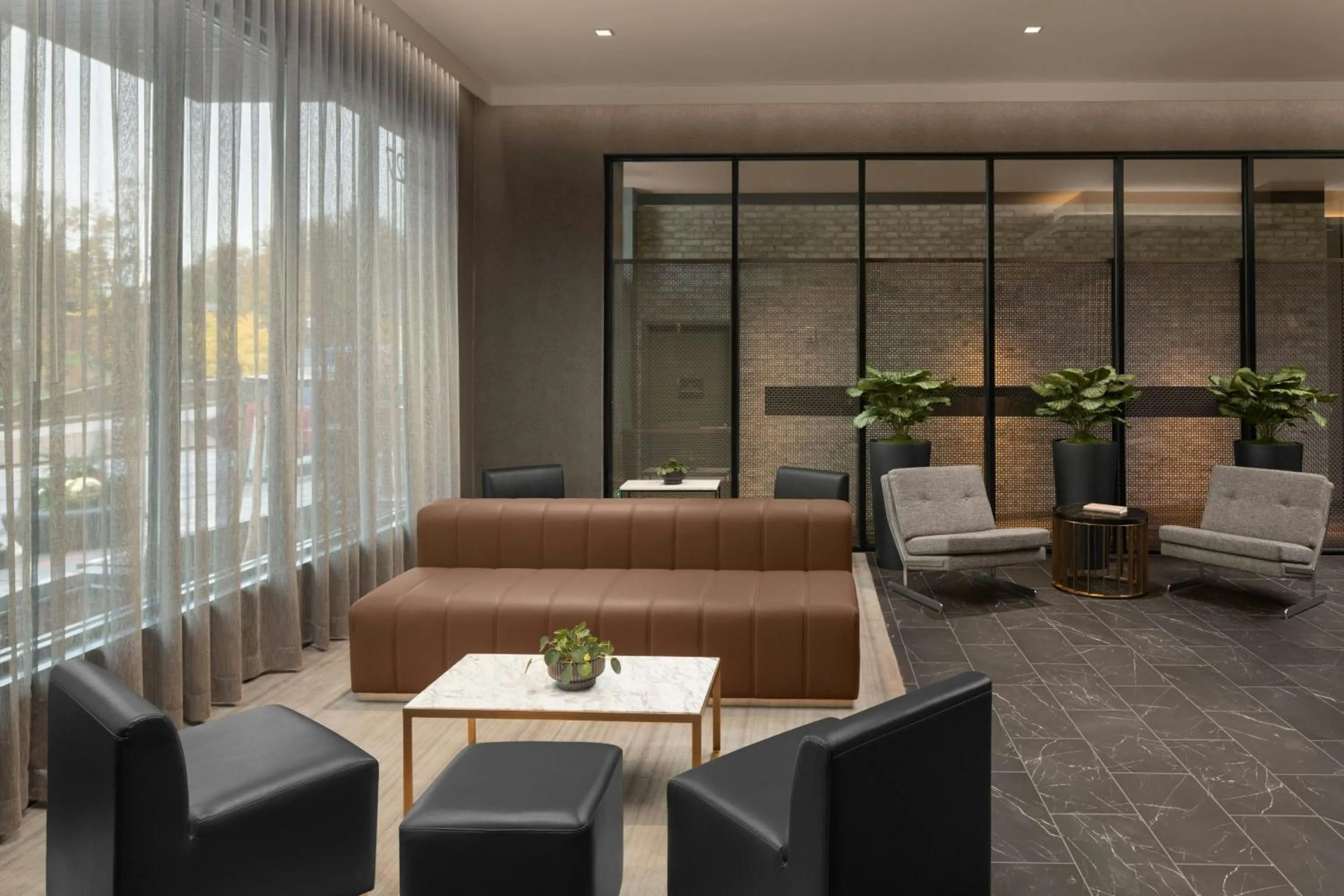 Lobby or reception in AC Hotel by Marriott St. Louis Clayton