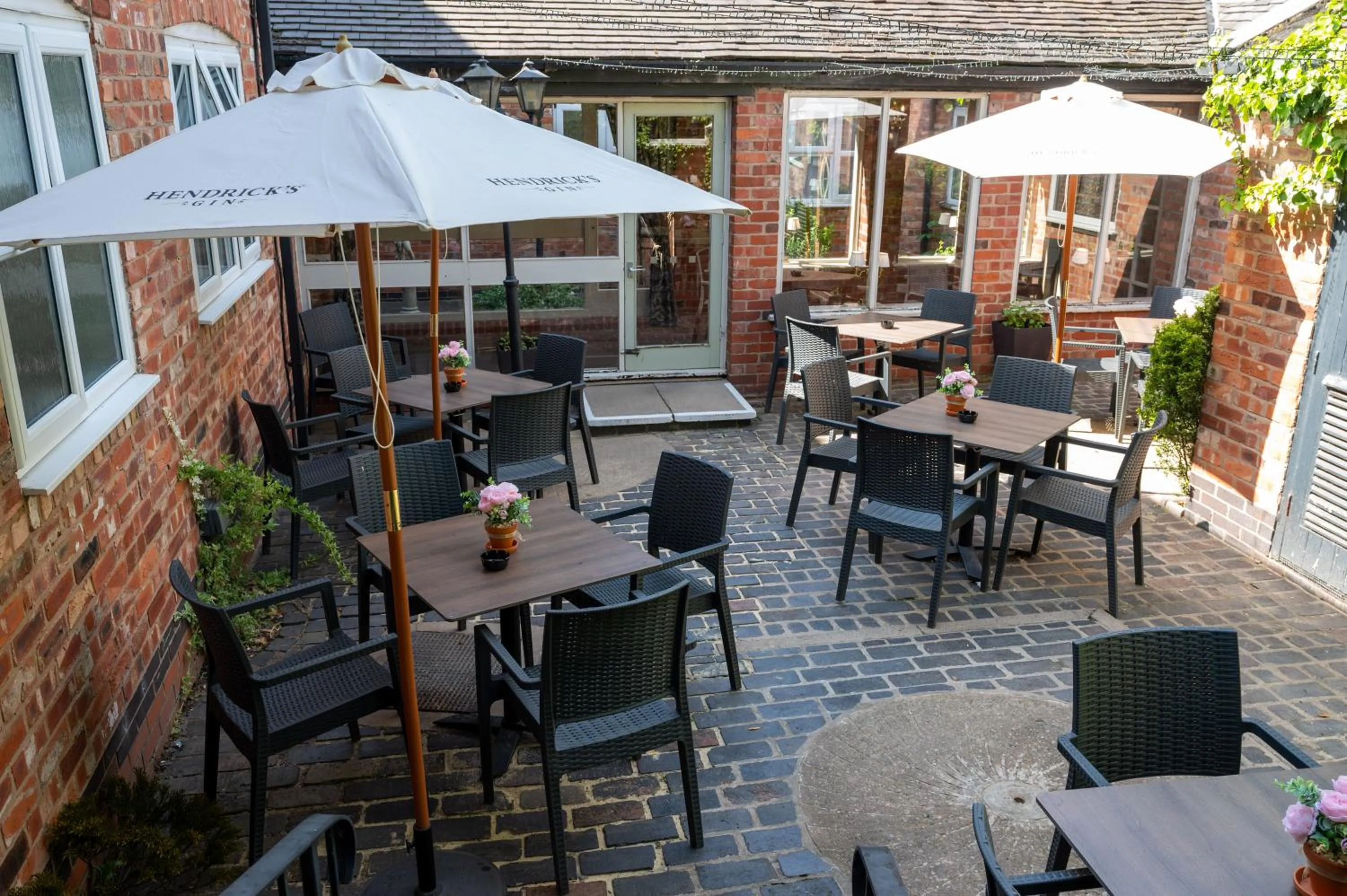 Patio in Millers Hotel by Greene King Inns