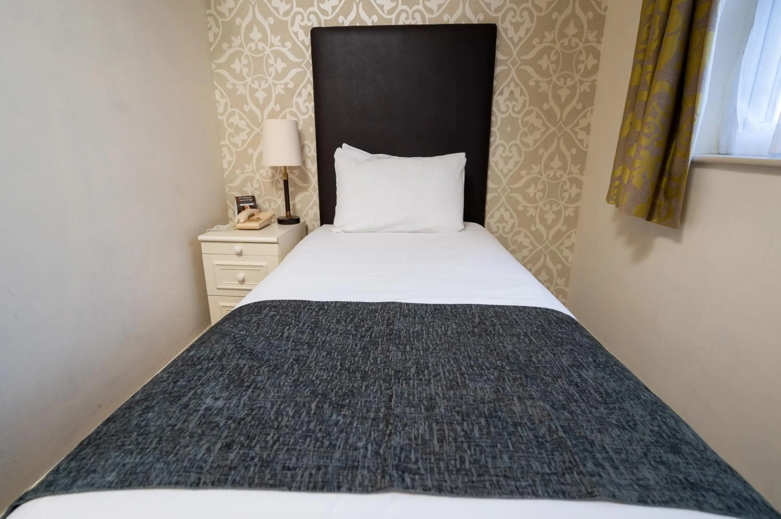 Bed in Millers Hotel by Greene King Inns