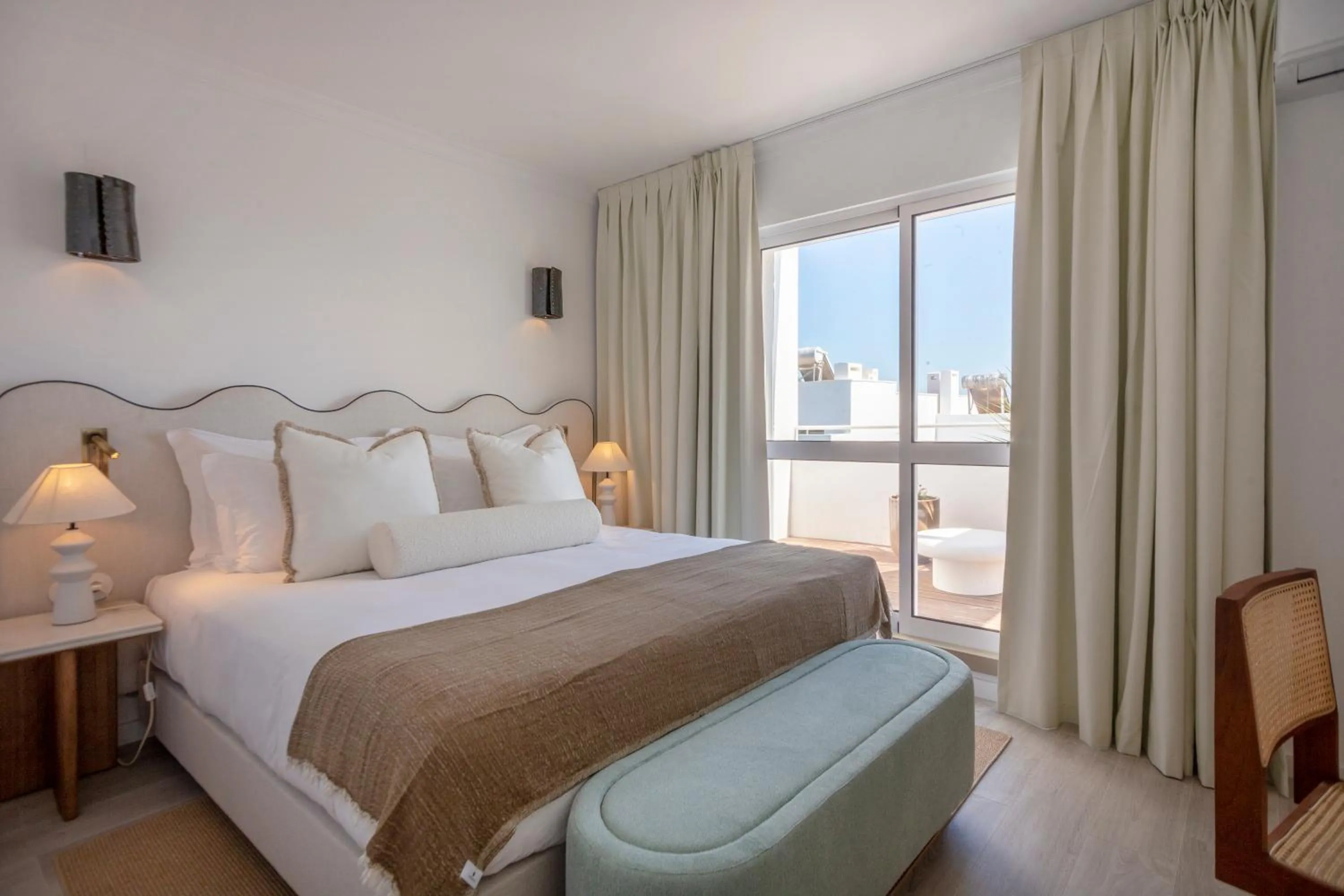 Bedroom in Villas d'Água Beachfront Resort